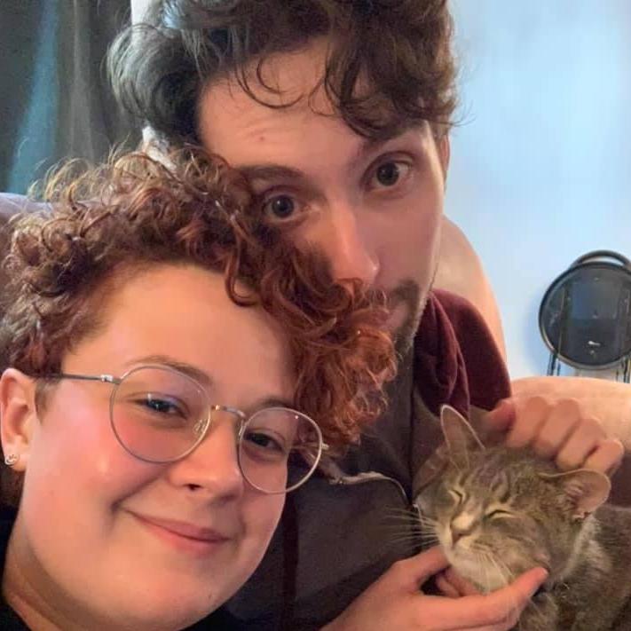 Not pictured: our other cat, Sethe, who is too cool for family portraits.