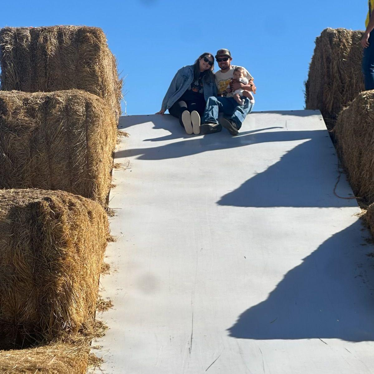 October 2025. Family slide fun.