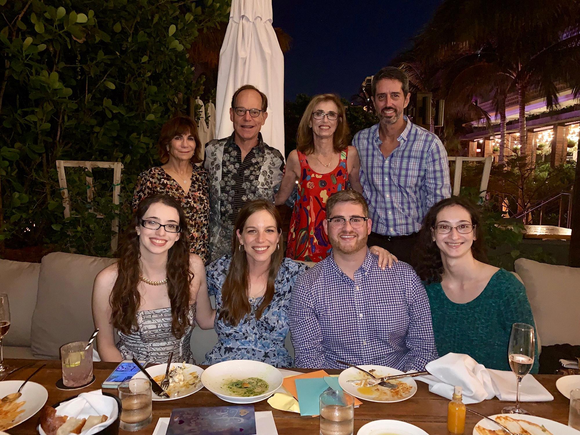 At our engagement dinner with our families.