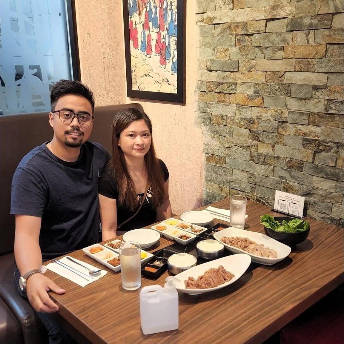 This photo captures our first date in 2022! We were a bit nervous and shy, but the laughter quickly took over. Who knew that awkward moments and cheesy smiles would spark our amazing journey?