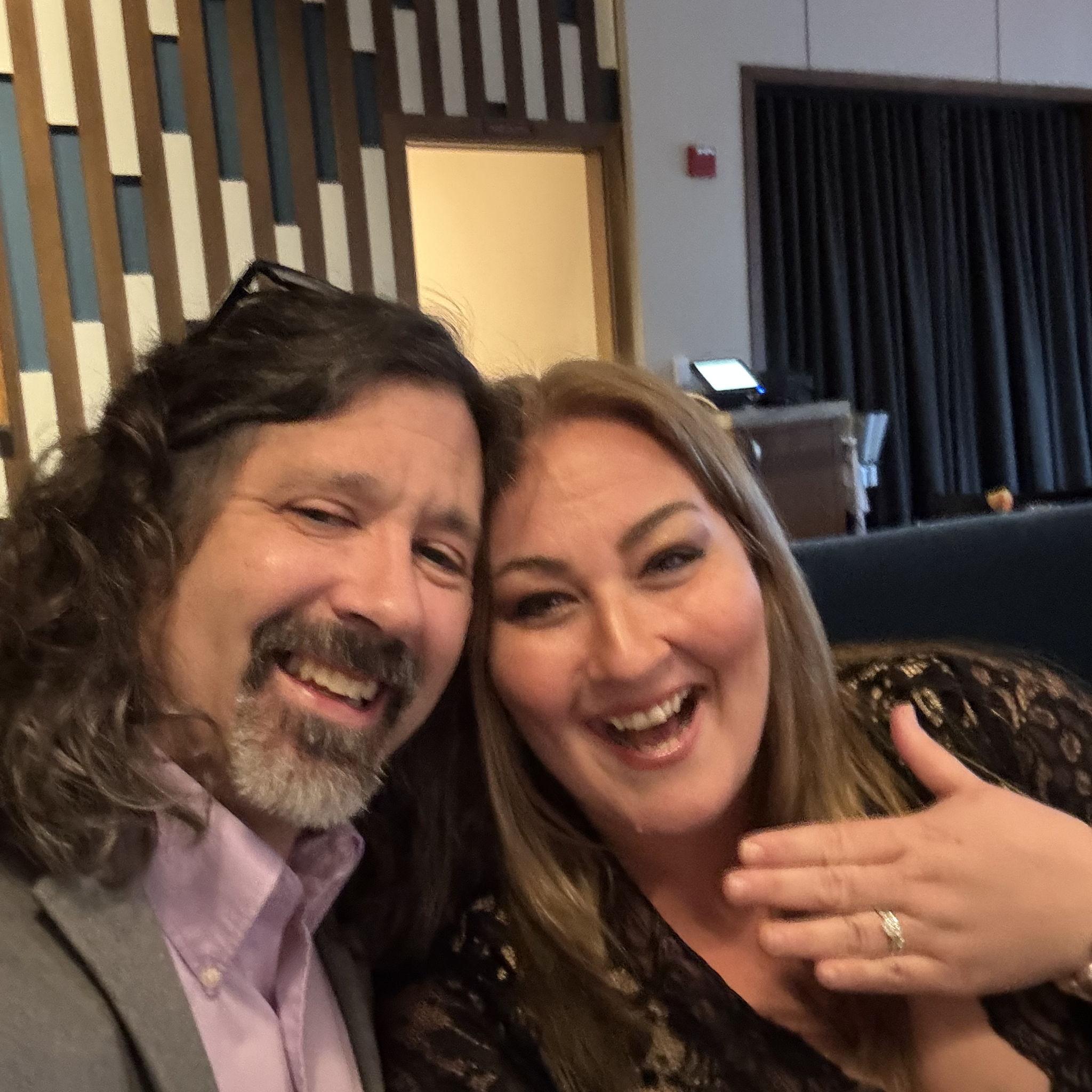 I think she likes the ring!