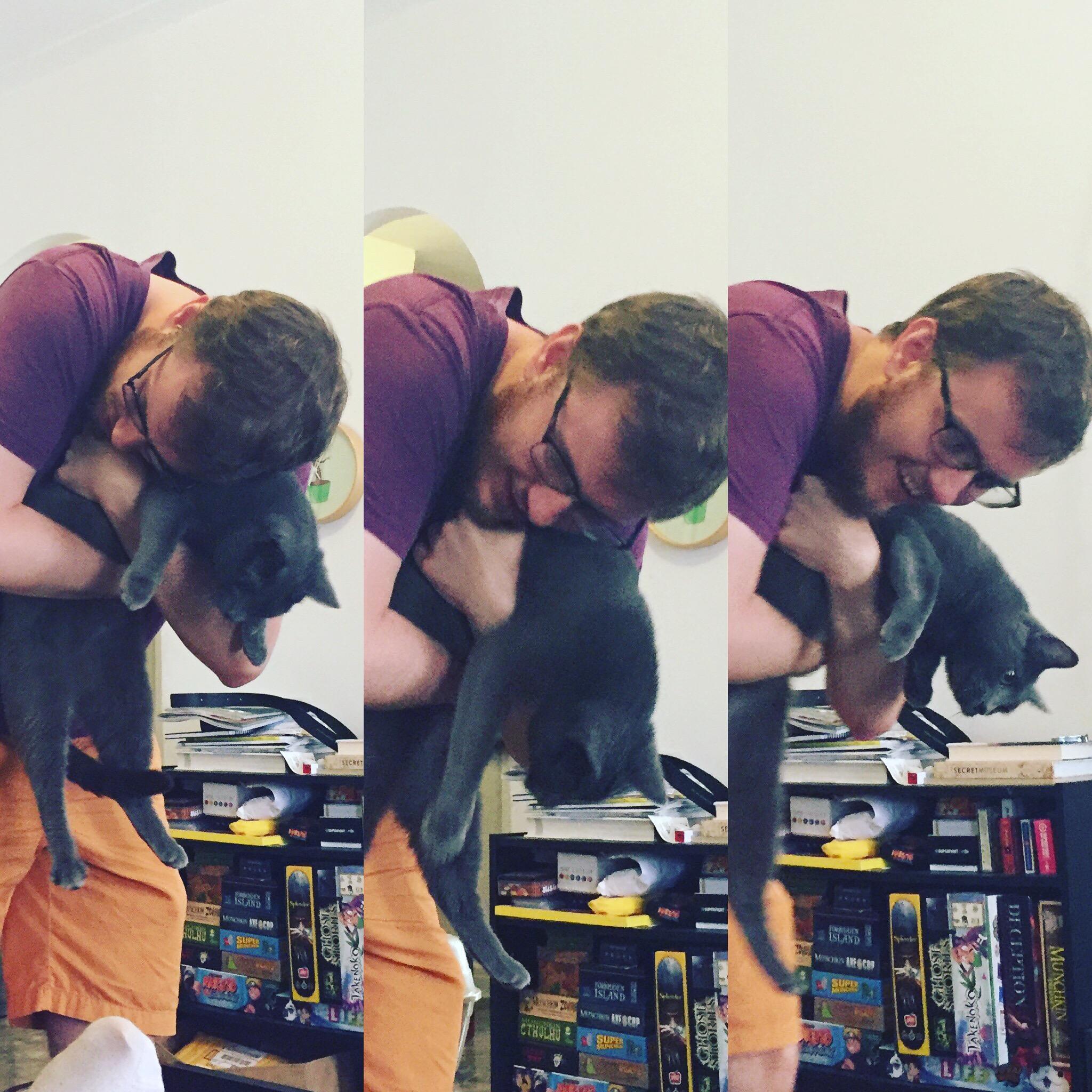 Ben bonding with Elissa and Dan's cat, Hale.