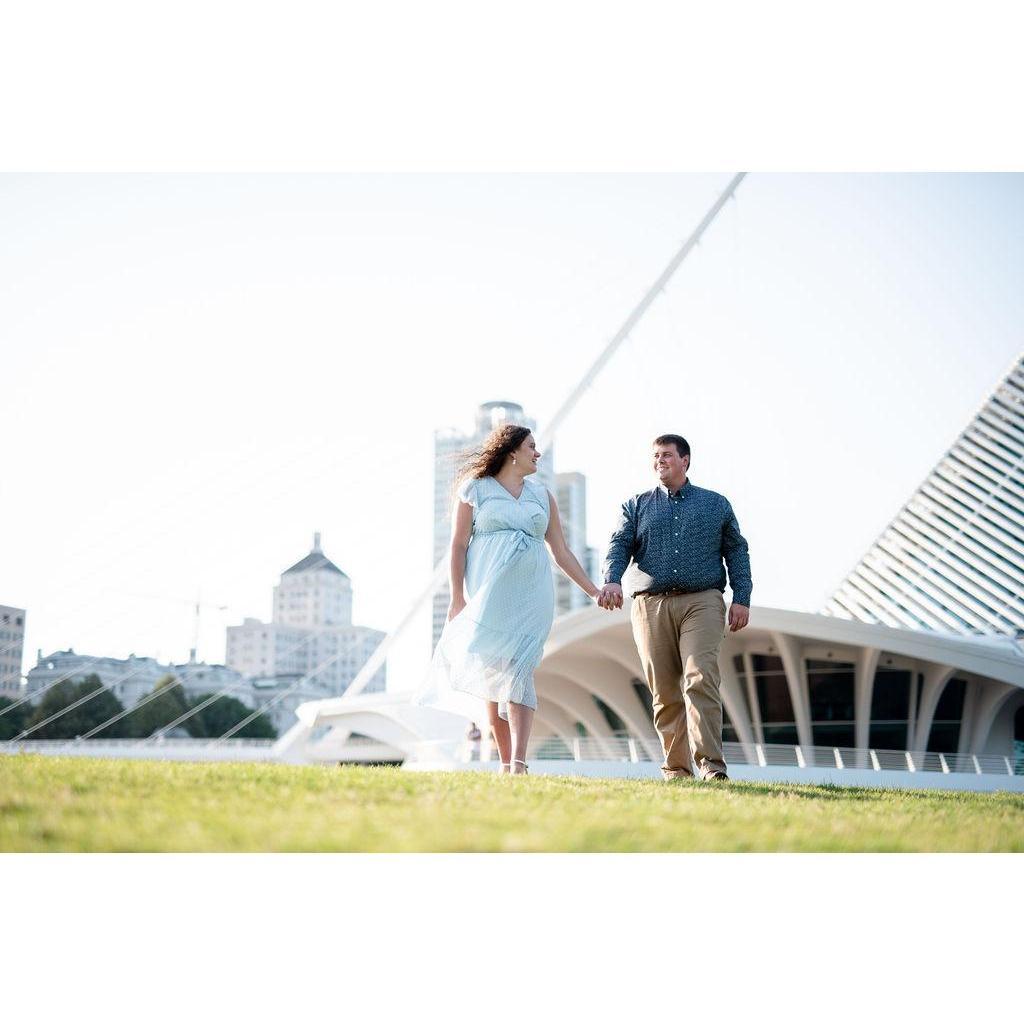 Our engagement photos by our amazing photographers - Irish Lane Photography.
Love the view of the Milwaukee skyline and Milwaukee Art Museum!