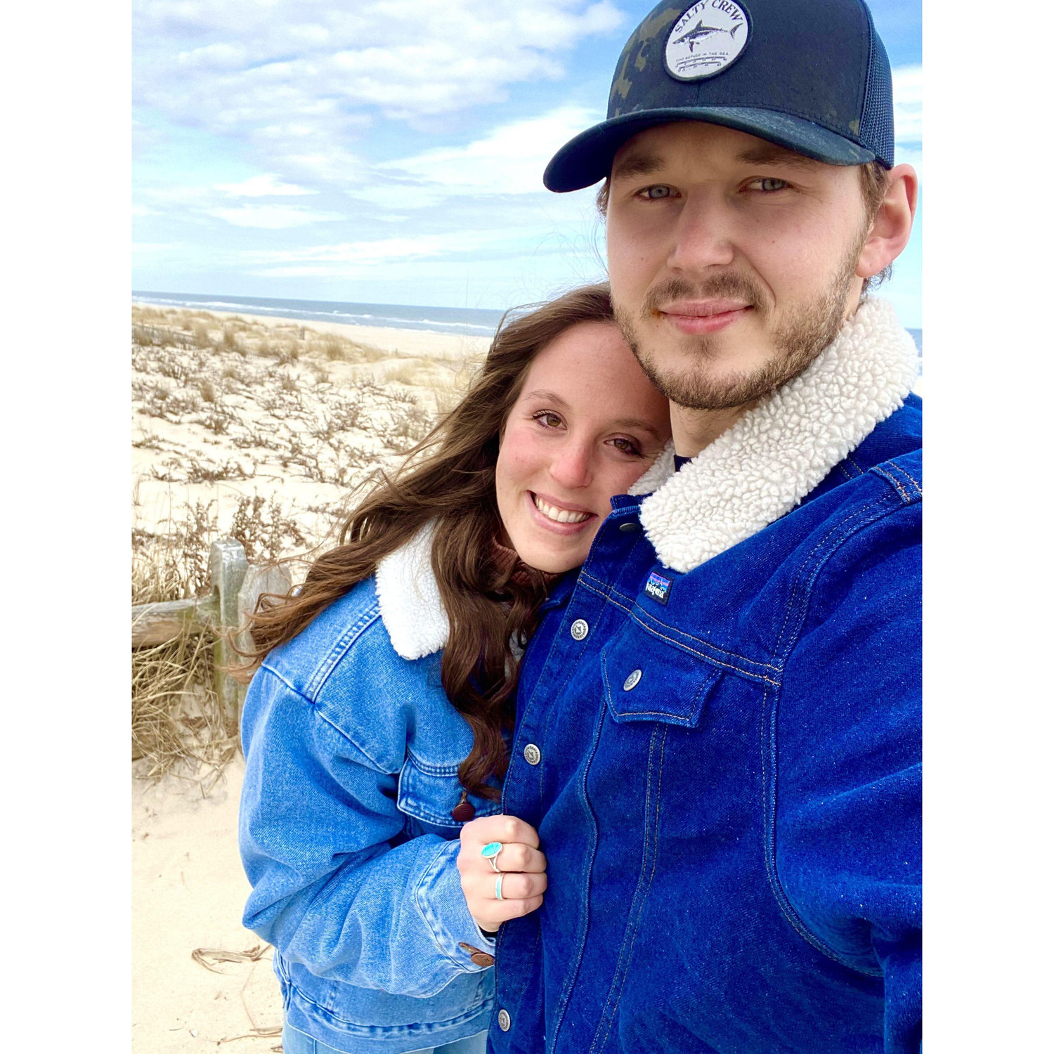 Matching jackets at the beach
