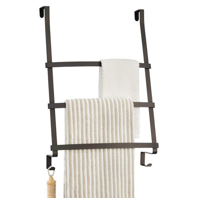 mDesign Modern Decorative Metal Over Shower Door Towel Rack Holder Organizer with Storage Hooks - for Bathroom Towels, Washcloths, Hand Towels, Loofahs and Sponges - Bronze