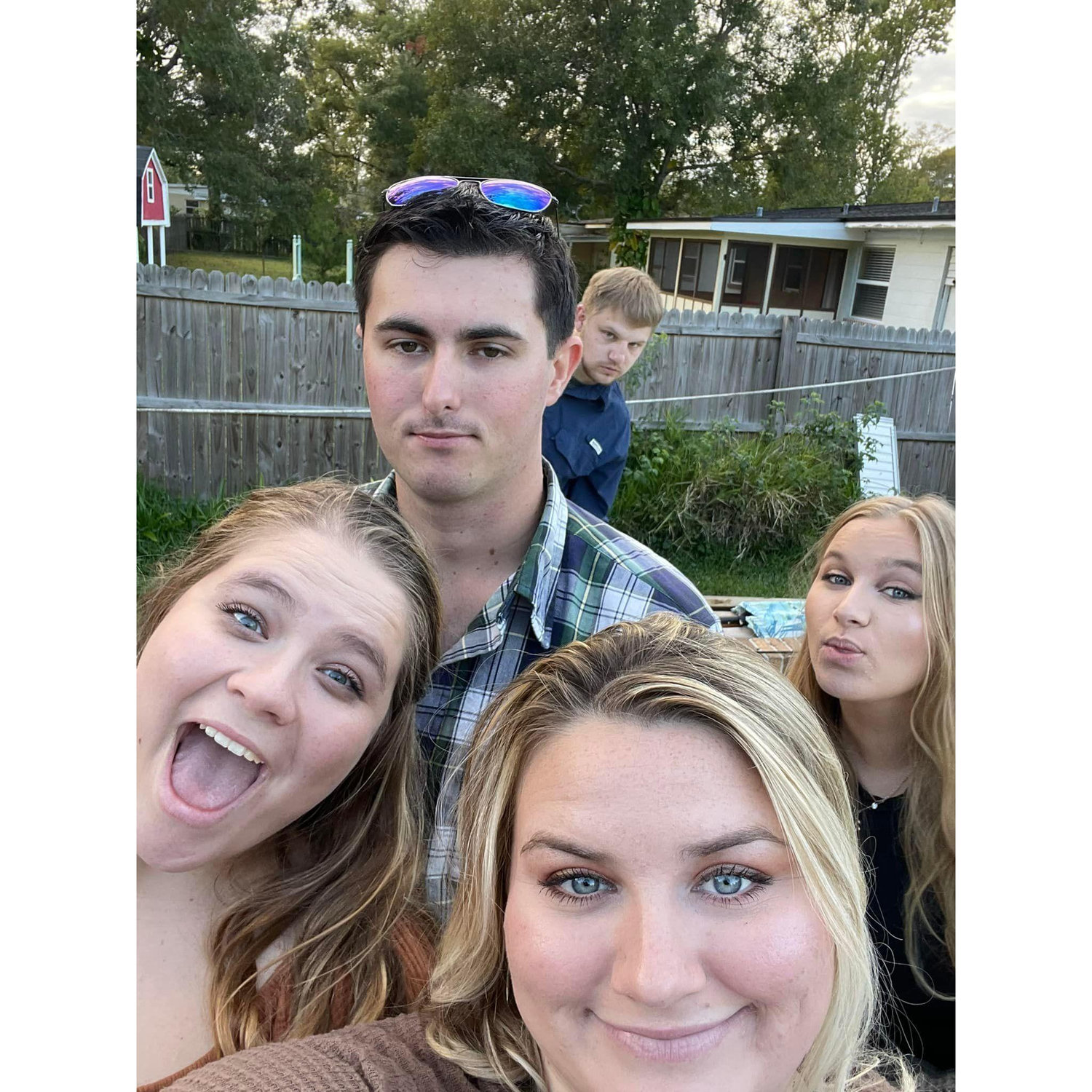 As we can see....he loves photos and my siblings