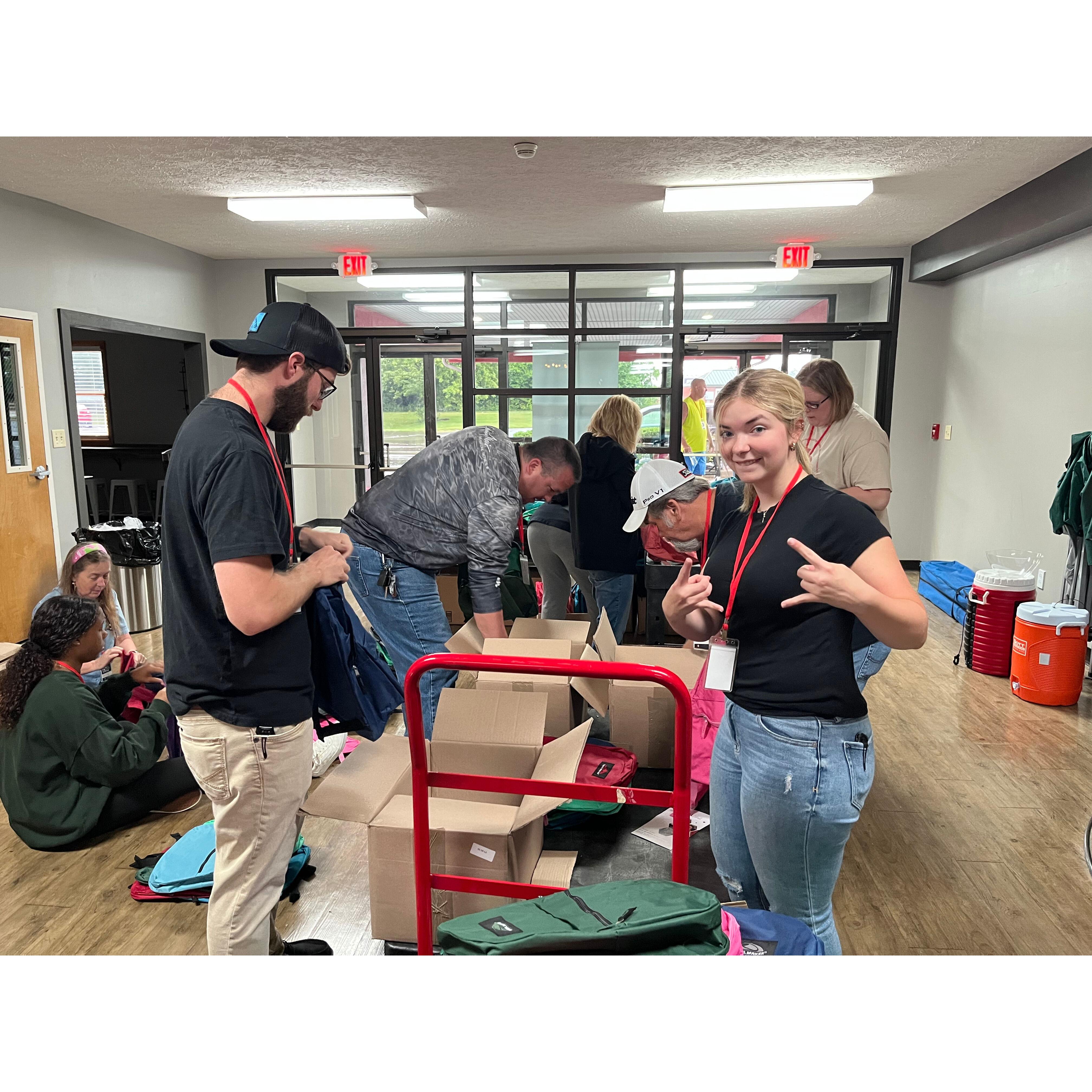 Us serving at Operation Backpack together