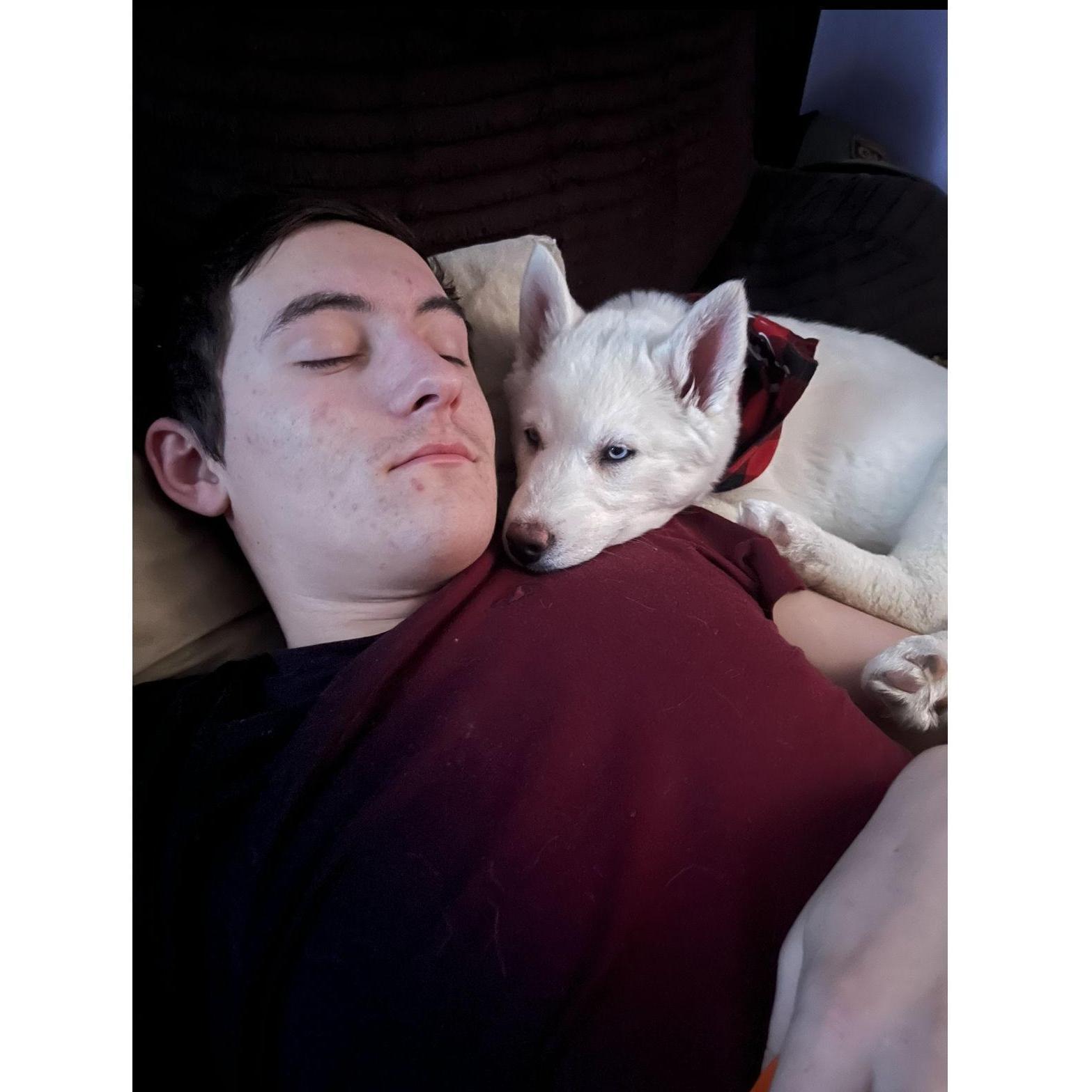Kevin and baby Iris cuddling.