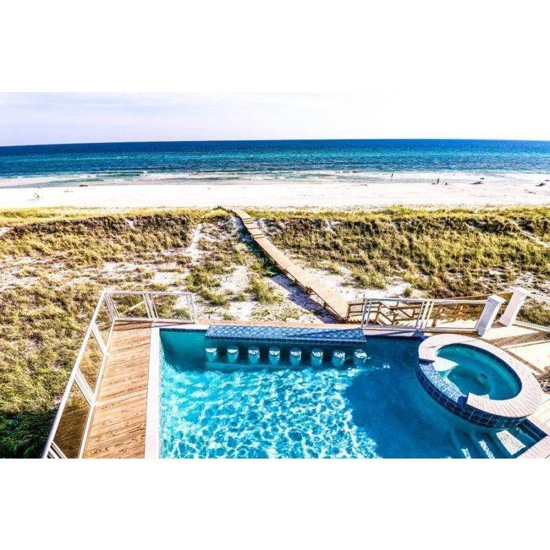 The private beach walkover to get to the sand where we'll say "I do" and dance the night away next to the waves!