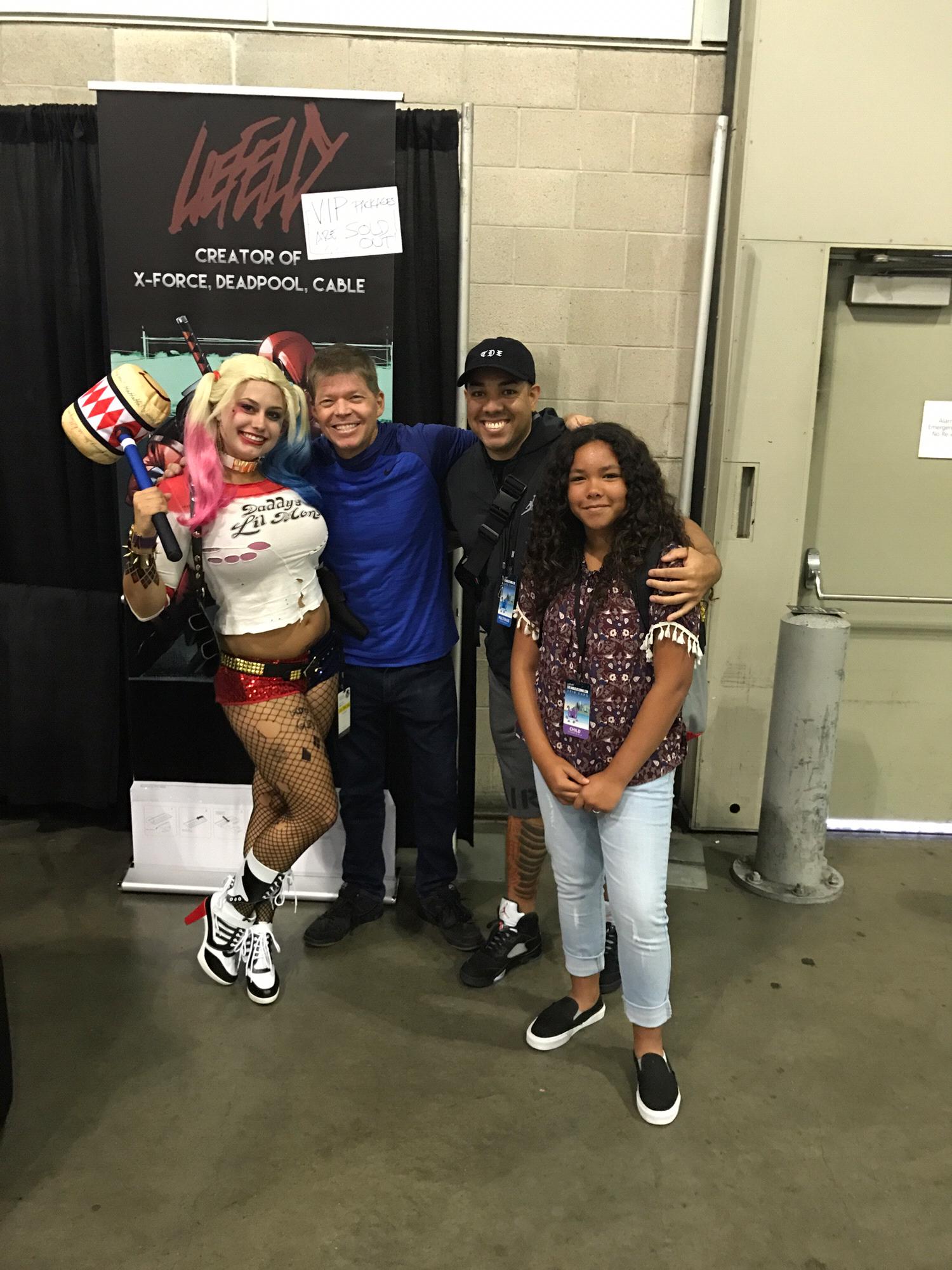 Erin, as Harley Quinn, with the creator of Deadpool, Rob Liefeld, Fred, and his daughter Audrey at the Stan Lee’s LA Comicon in October 2016.