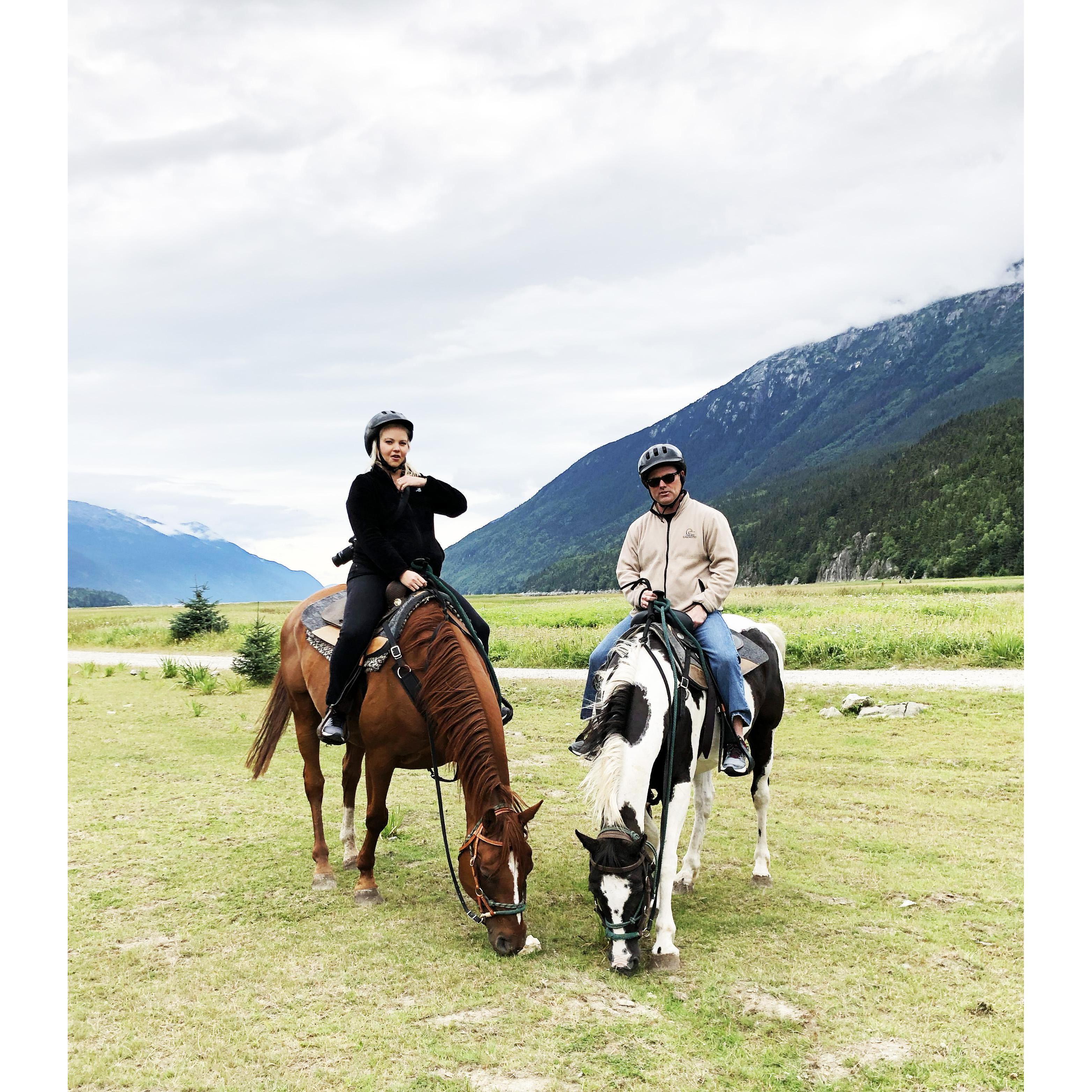 Outside of Skagway, Alaska 7/2019 our horses (on left, Too Shy and Richard on the right) got to stop for a snack. Brett still looks thrilled. :0)