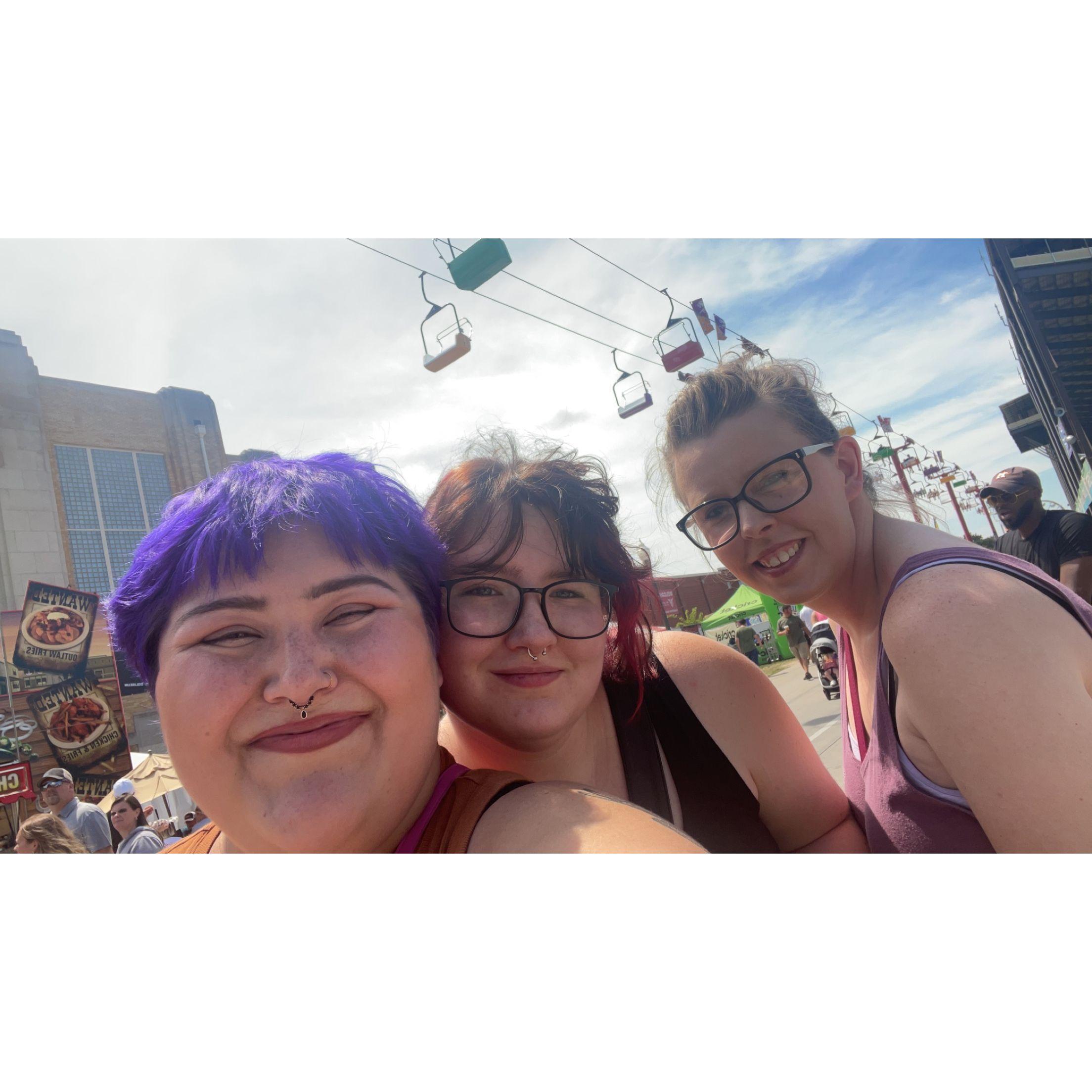 The State Fair! Victoria forgot to take the pocket knives out of the purse... so we trekked back to the car in the heat :( It's okay, lots of good food was had to make up for it. [Pictured: Mom Jean]