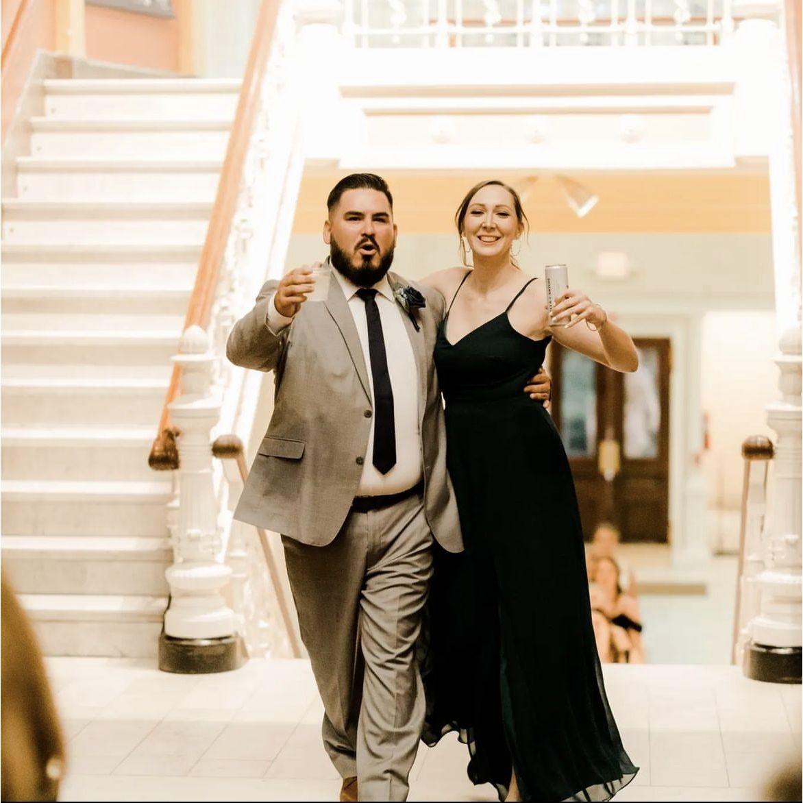 Prior to us starting to date our friends put us both in their wedding party - this was being introduced at their reception...the rest is history