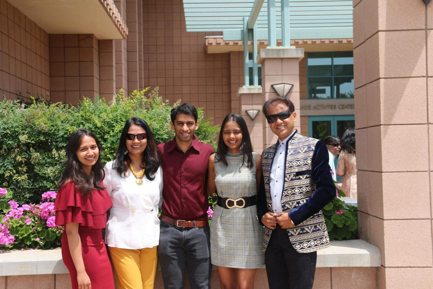 (Summer 2019) Family click after Kinjal addresses her graduating class during a luncheon...