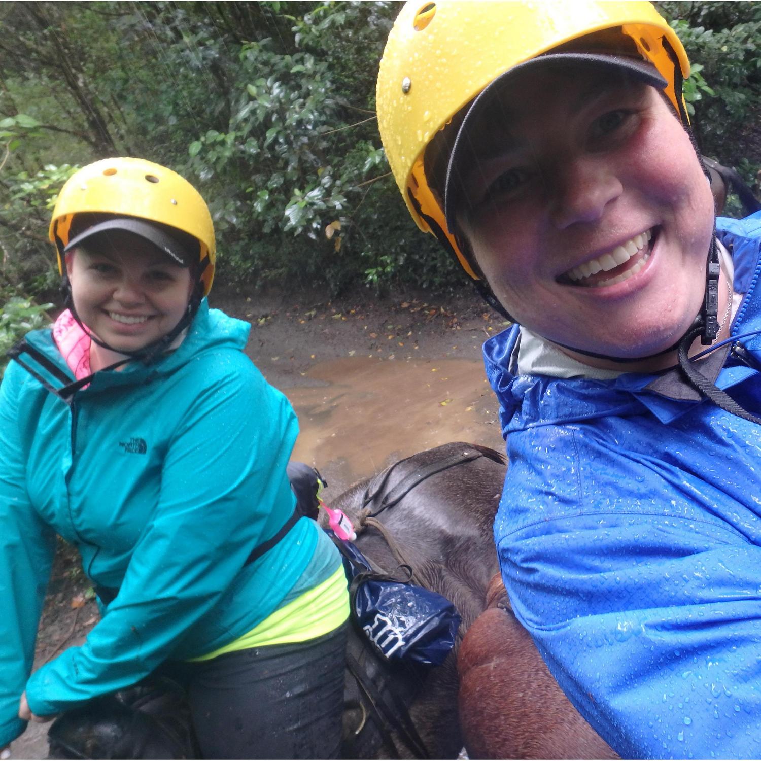 Horseback riding in the cloud forest during a rainfall in Costa Rica