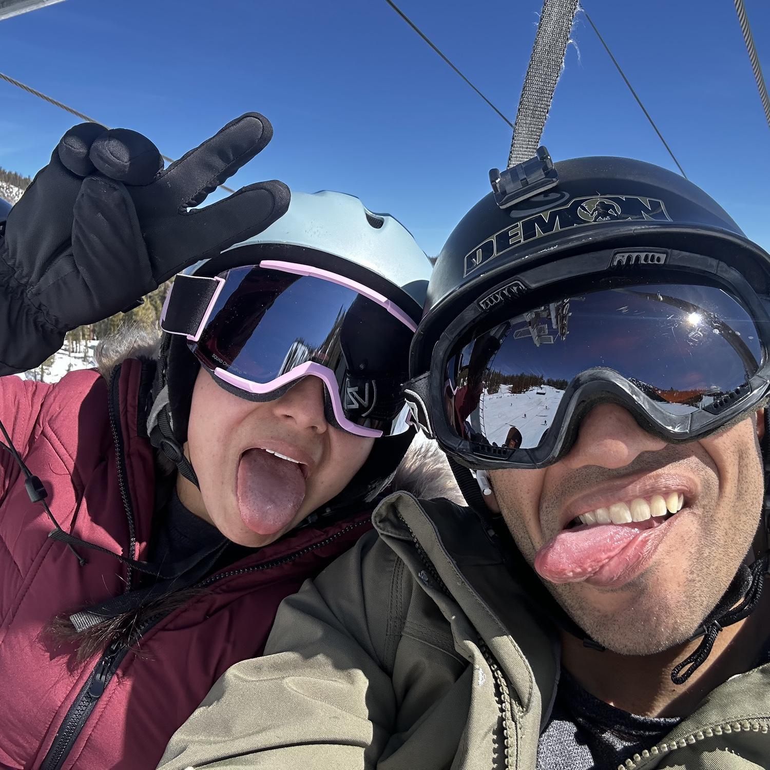 Michael has grown up snowboarding. This is a picture of us on the ski lift right before Saribel's firsts time snowboarding. Michael was the best teacher!