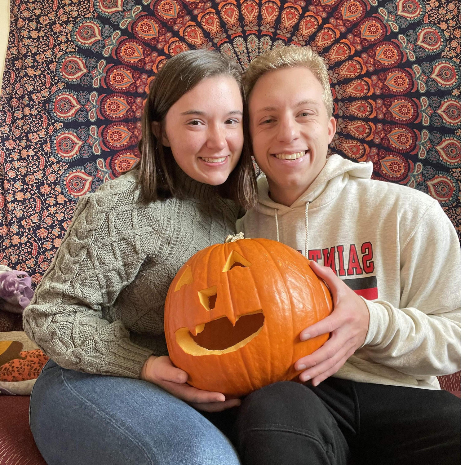 The day after our anniversary, we carved our pumpkin in Alexis' dorm