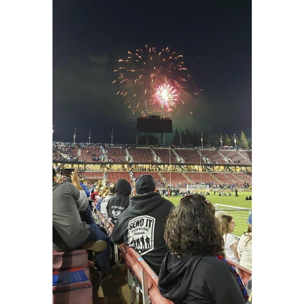 Burcu and Patrick at an MLS game at Stanford Stadium...that happen to be coupled with a fireworks show.