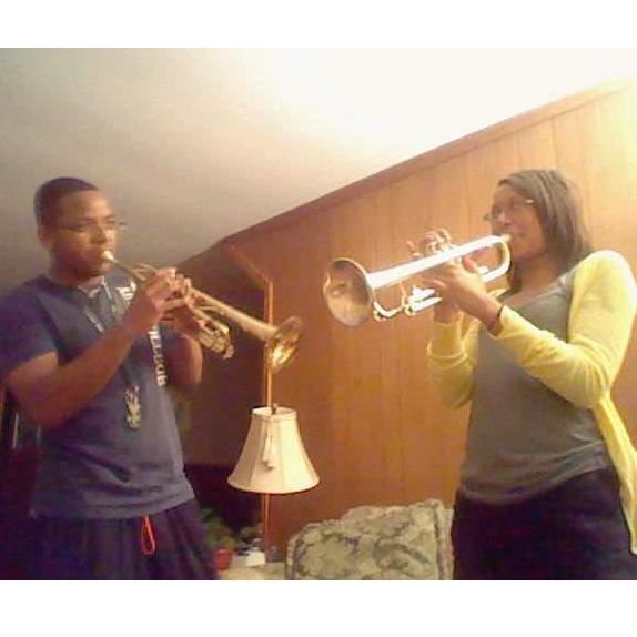 Very Young Felix showing a Very Young Camera how to play trumpet - circa 2011