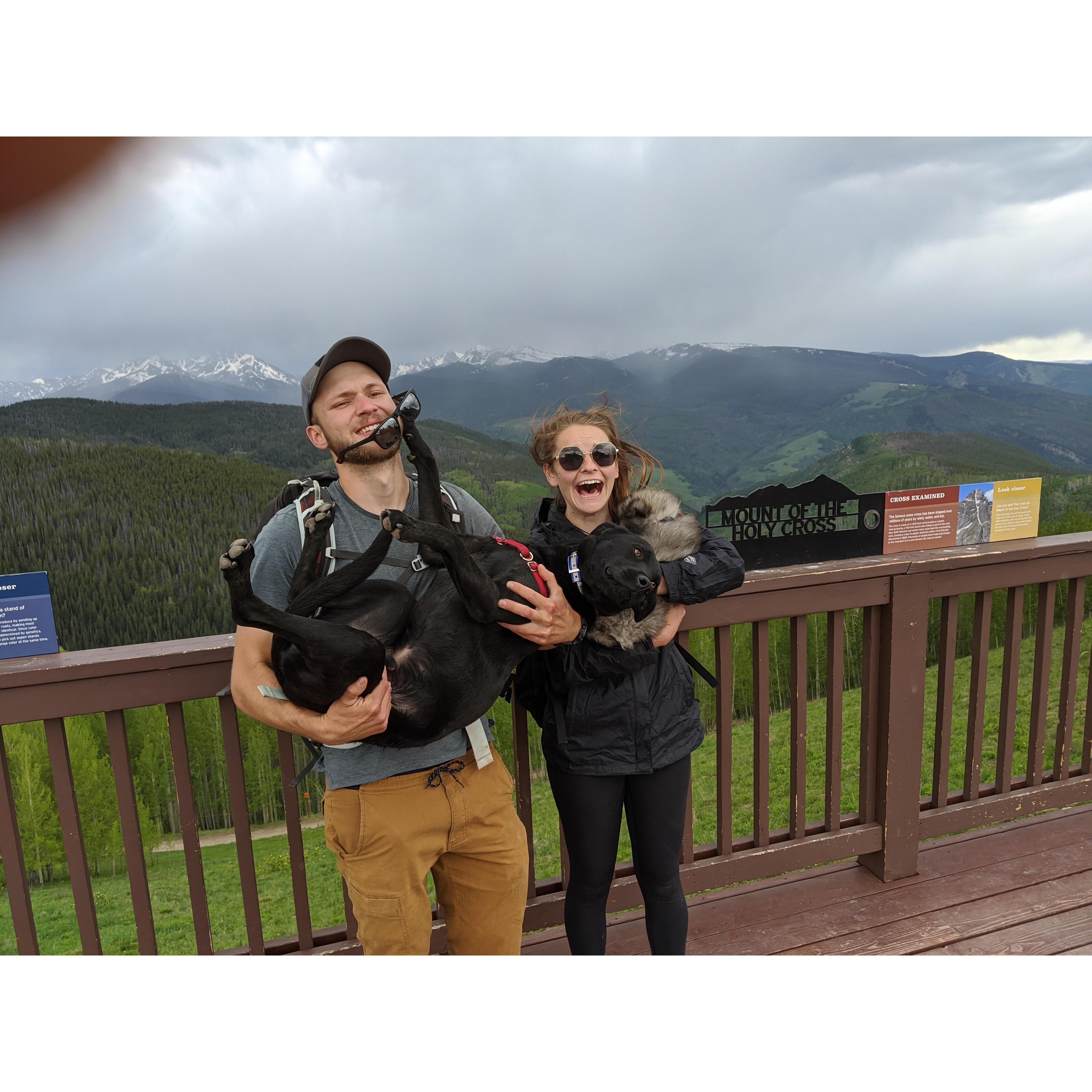 After Jonah proposed, we hiked down the mountain in a torrential downpour. This was attempting to get a picture as a family. I love the chaos of it-- it's so funny!