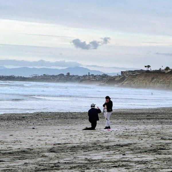 Some kind strangers saw Steven proposing and gave these photos to us!