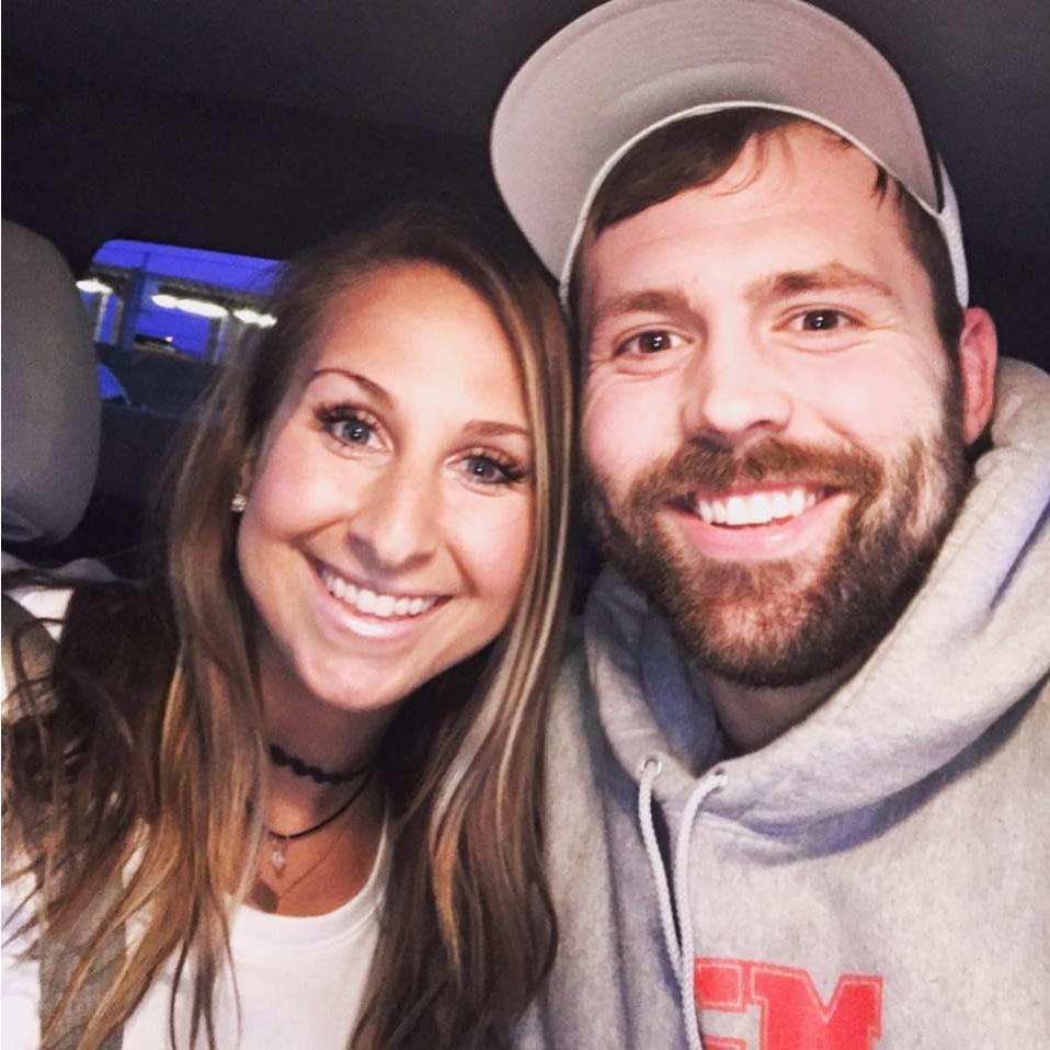 Our very first photo together- after a six hour flight delay!