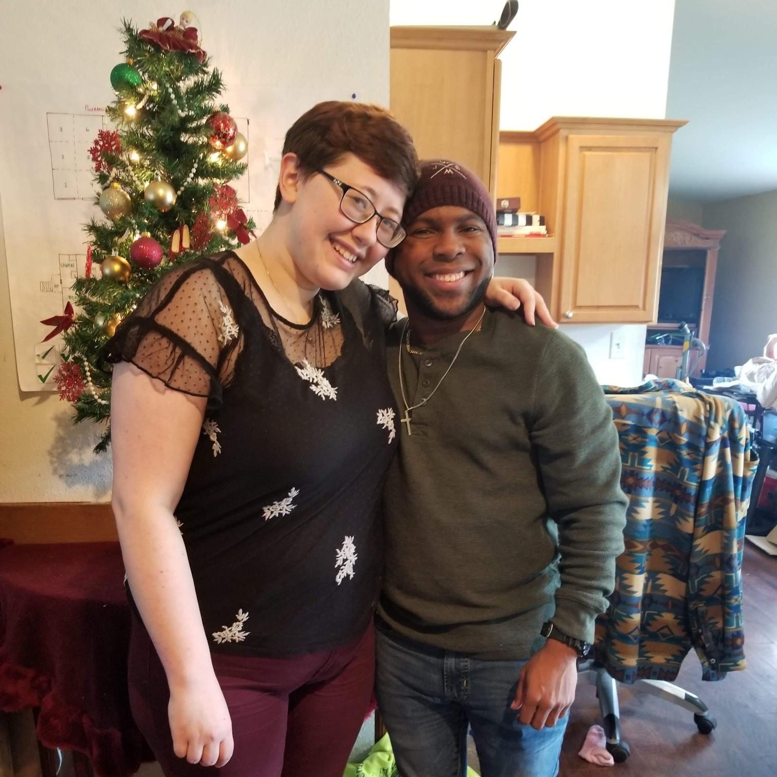 Taken at the last Christmas we had together before Teleia moved. Because they were packing, they ended up only putting up a mini Christmas tree which is what's in the background.