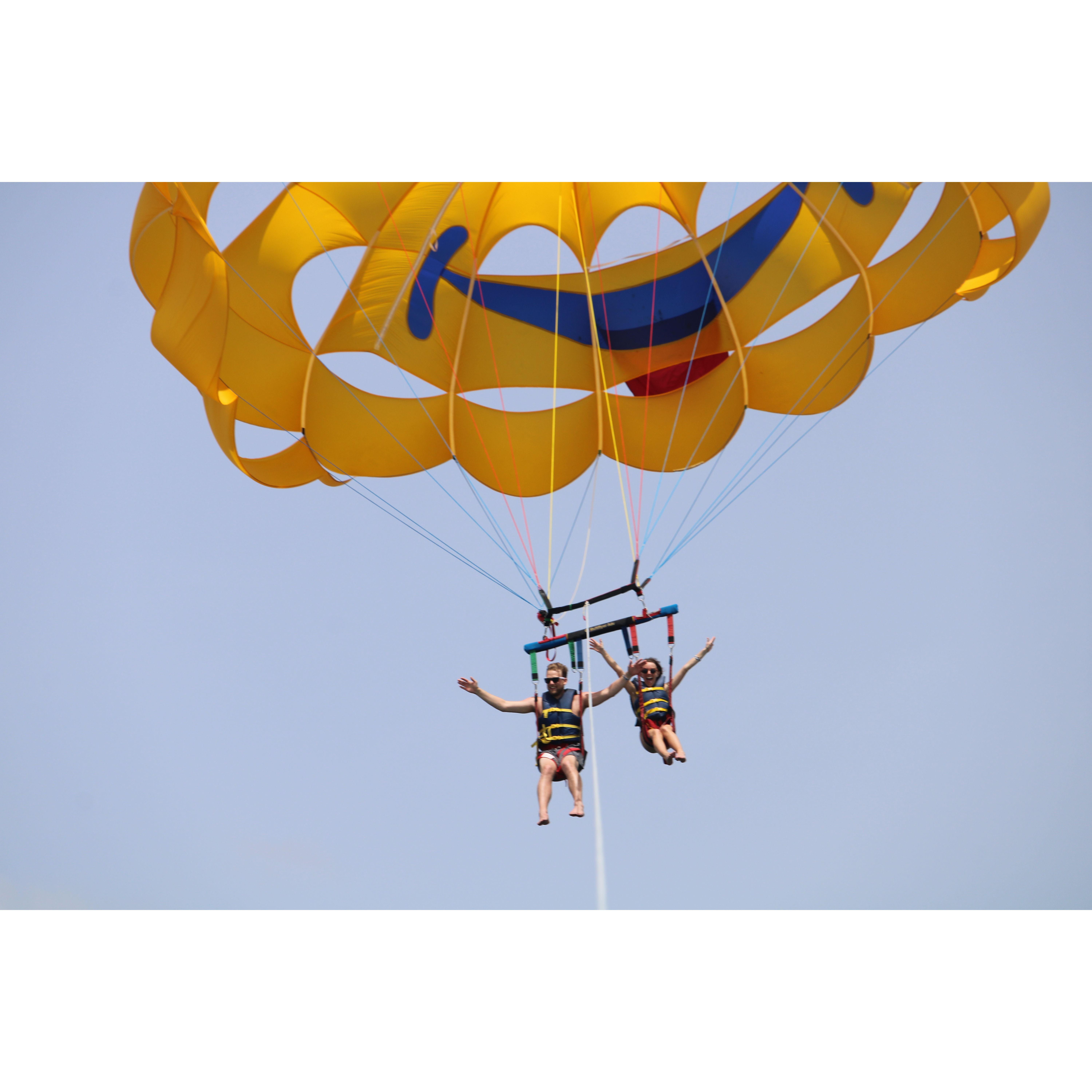 To new, and sometimes scary, adventures together! Parasailing in St. Pete's Beach, Florida