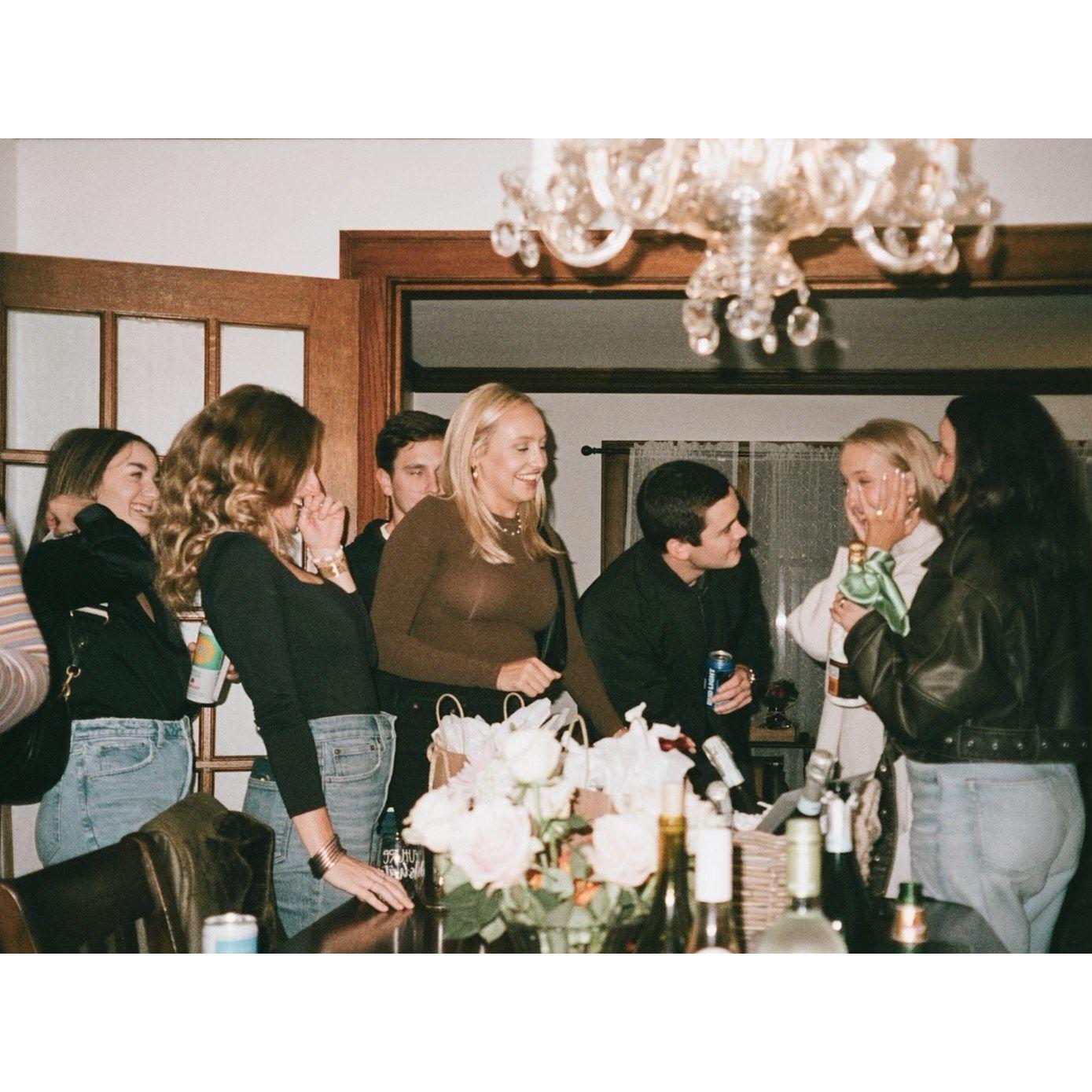 Immediately after the proposal, Tommy surprised me with a party with all of our friends and family.