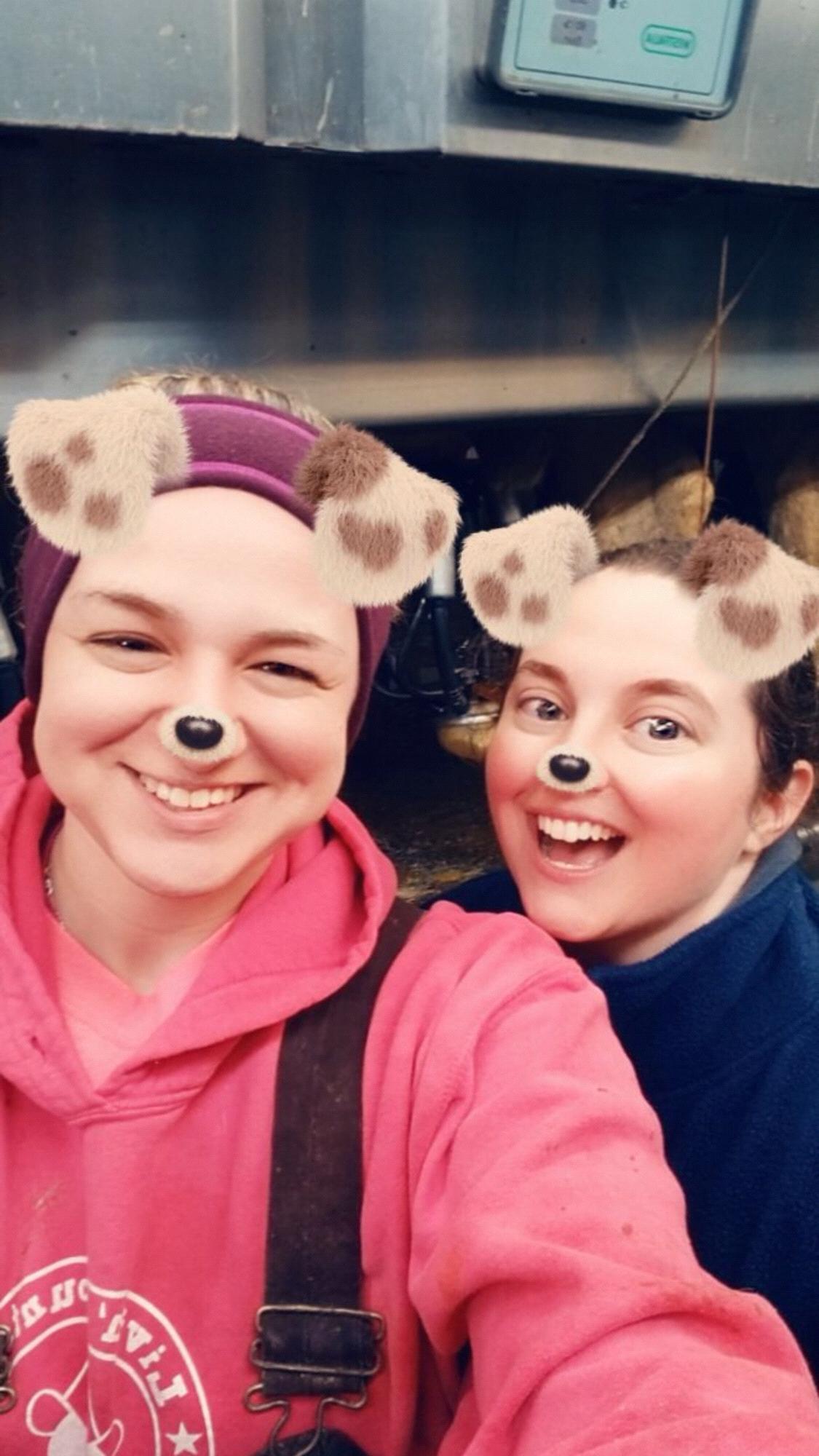 Joanne and Cathryn in the milking parlor at Mid-View Farm