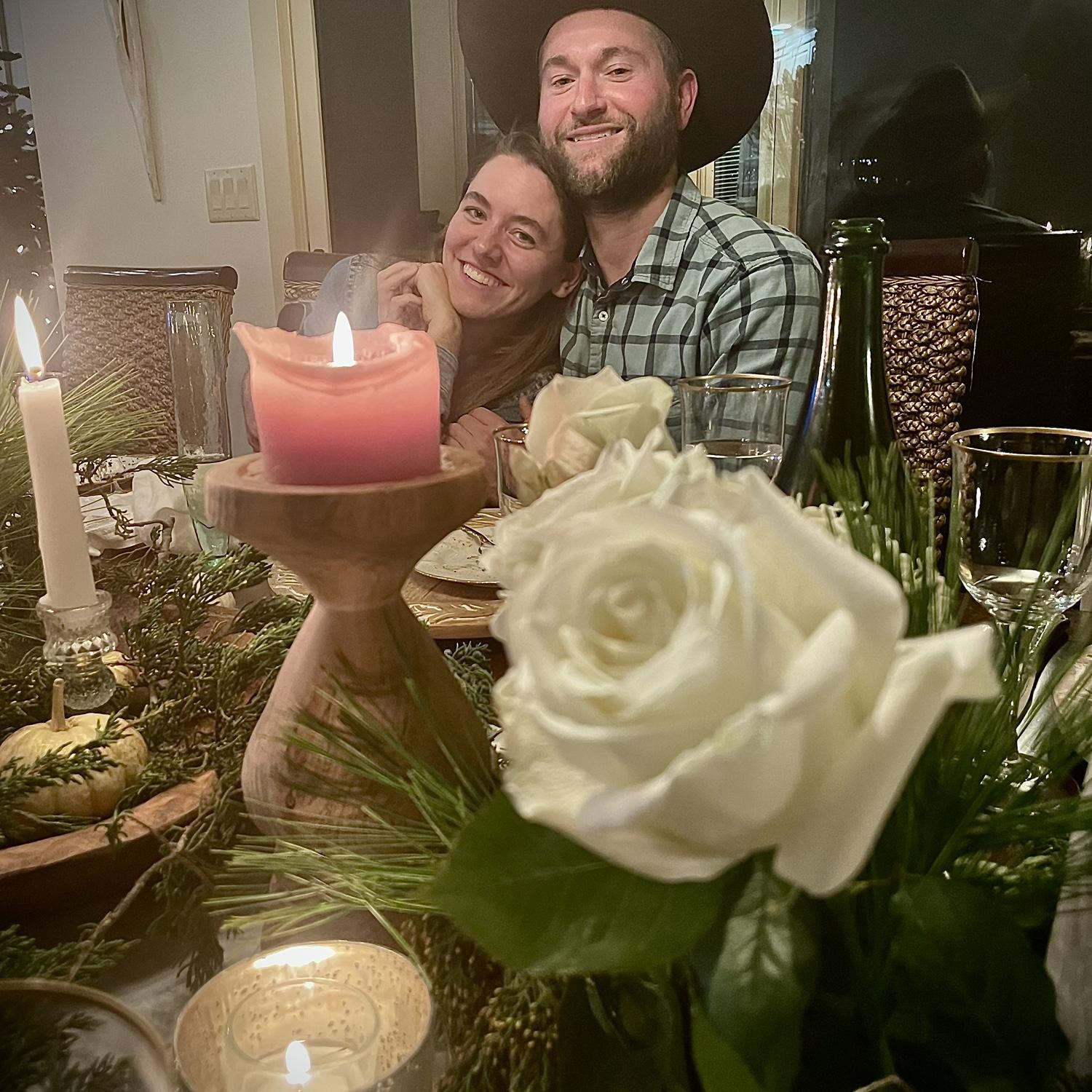 Two smiles with candles & flowers is such a simple treasure.
