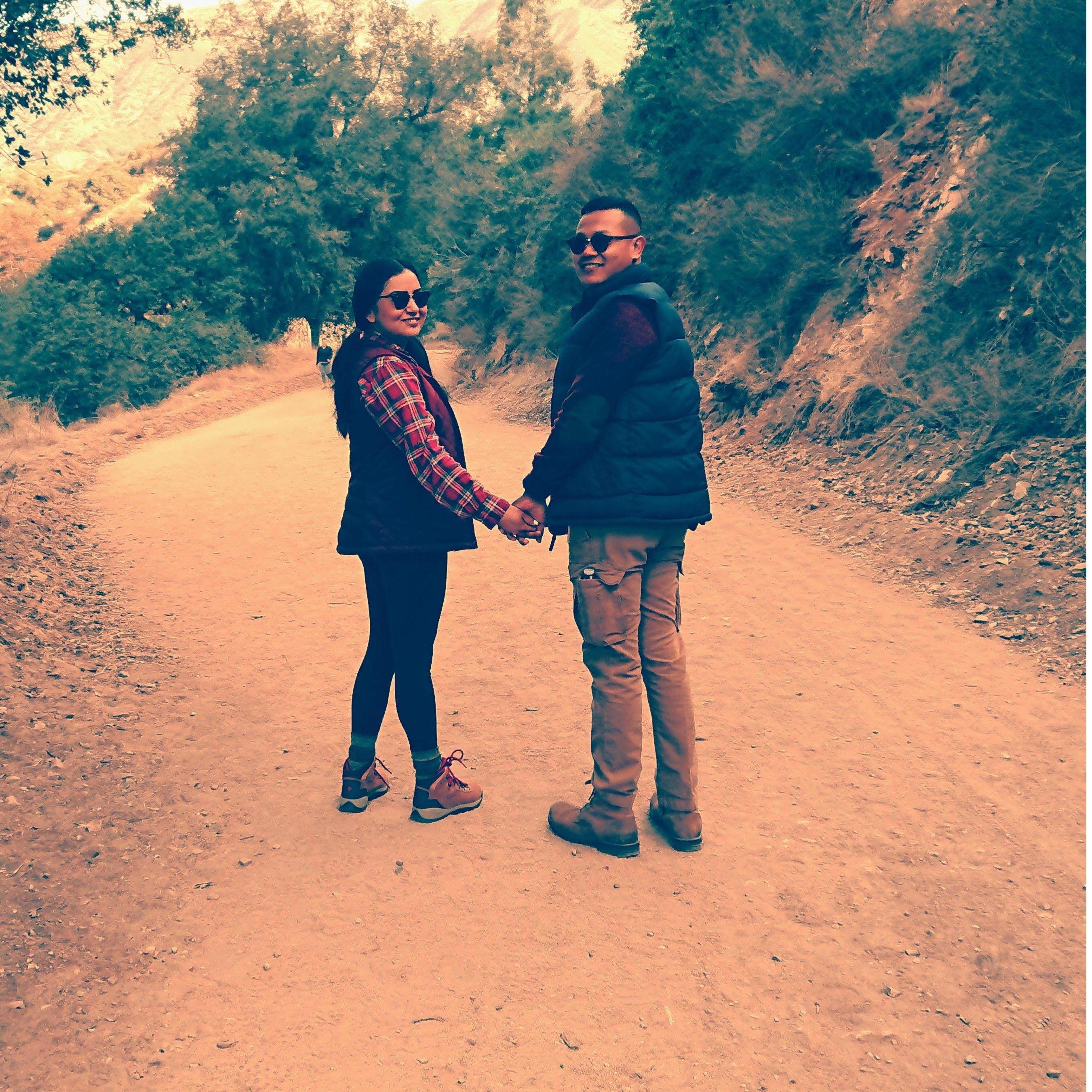 I can’t see her falling. So I hold her hands.