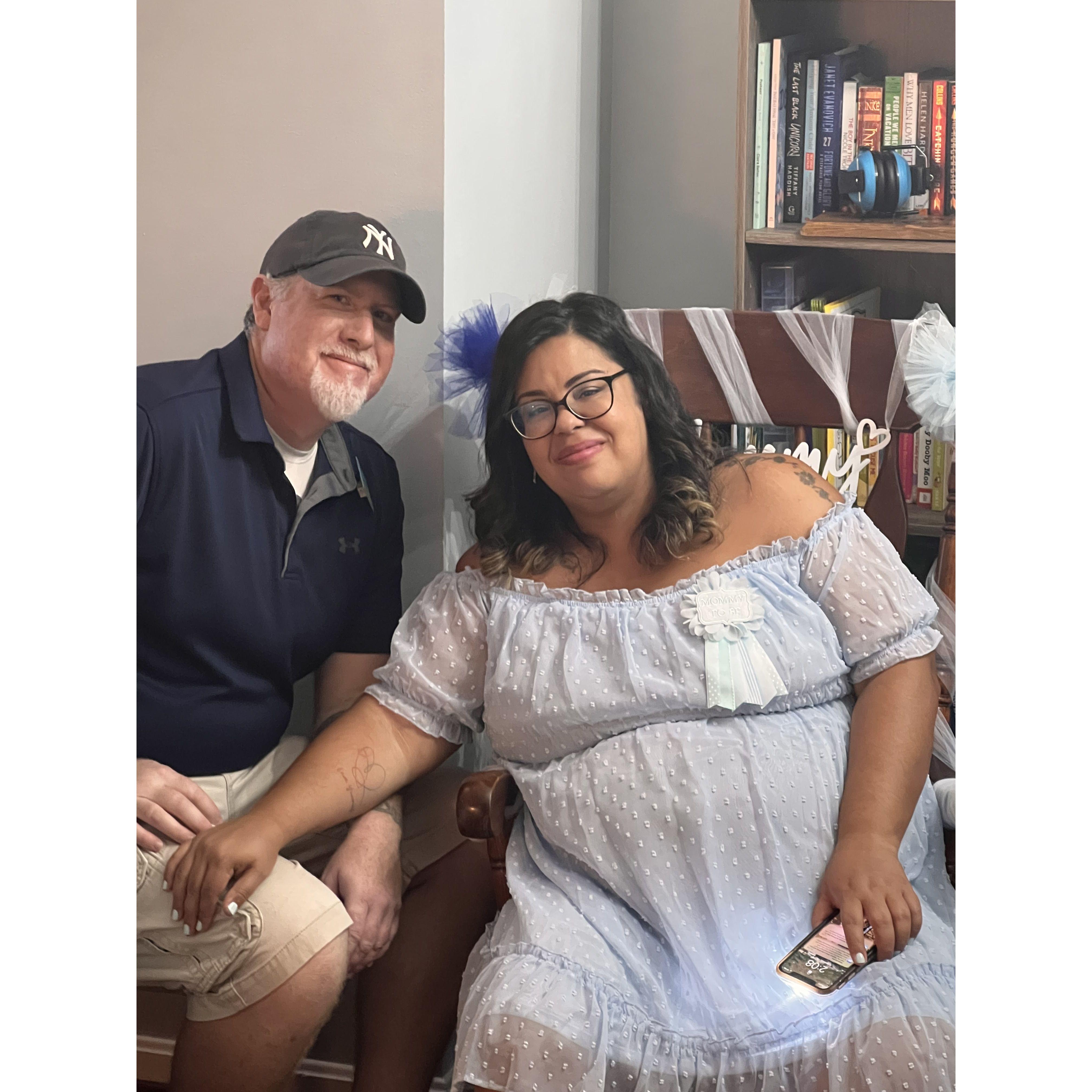 Liam’s baby shower we couldn’t wait to meet our baby boy. Andrew is holding something in his pocket, waiting to pop the question.