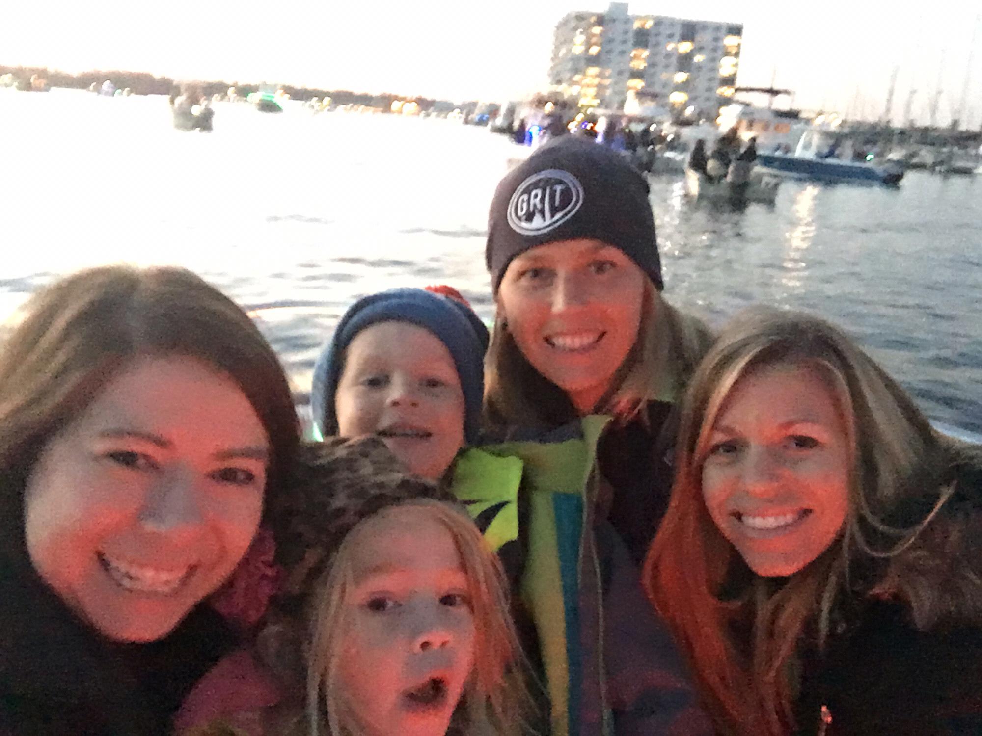 Out on the boat with Jan, Hudson, Hadley, and Christy for the Floatilla