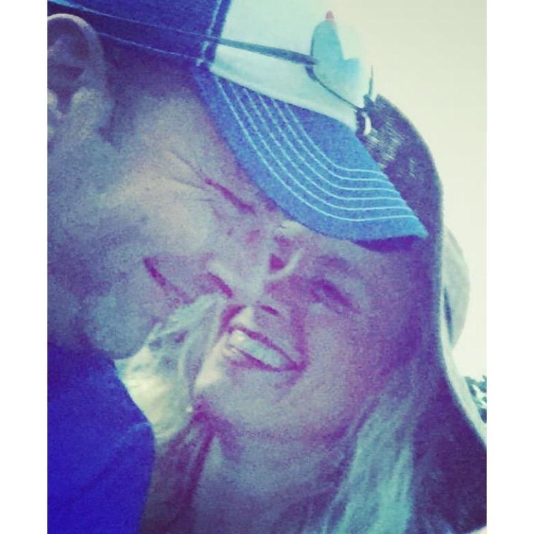 We were at a concert, & laughing over how hard it is for me to hold the phone for a selfie when I accidentally hit the button & got our favorite picture EVER!