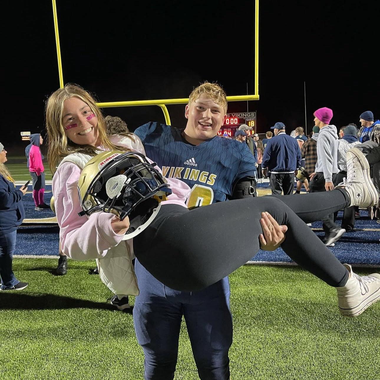 Elly supporting Carson at his Football Games always