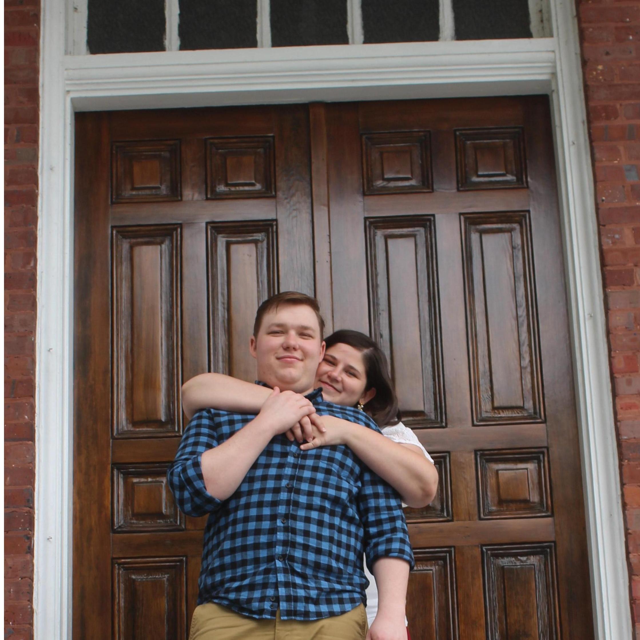 In front of the doors of the church we will be married at.