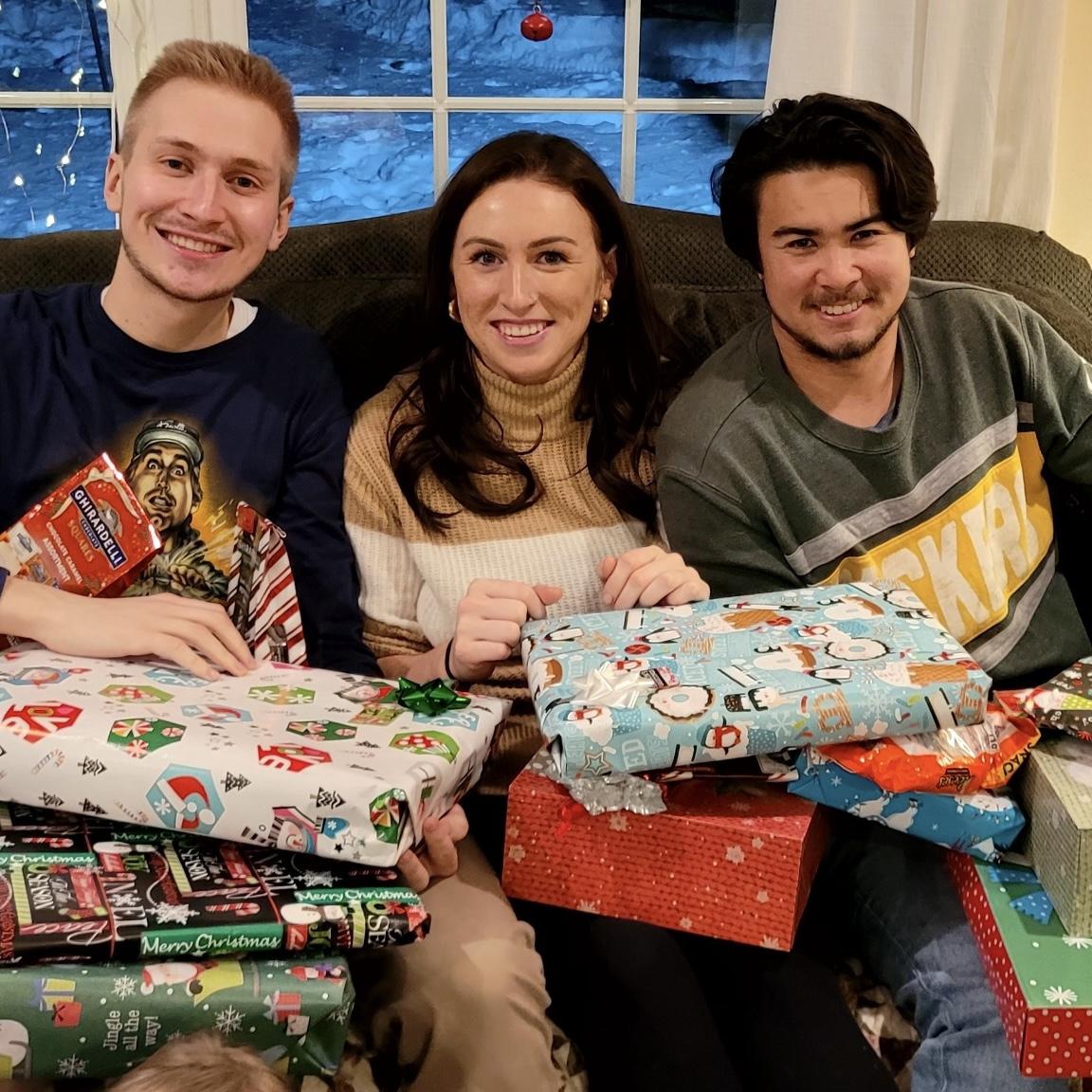 opening presents on christmas eve with ambers little brother gage! always how we have done it in the eisold family :)