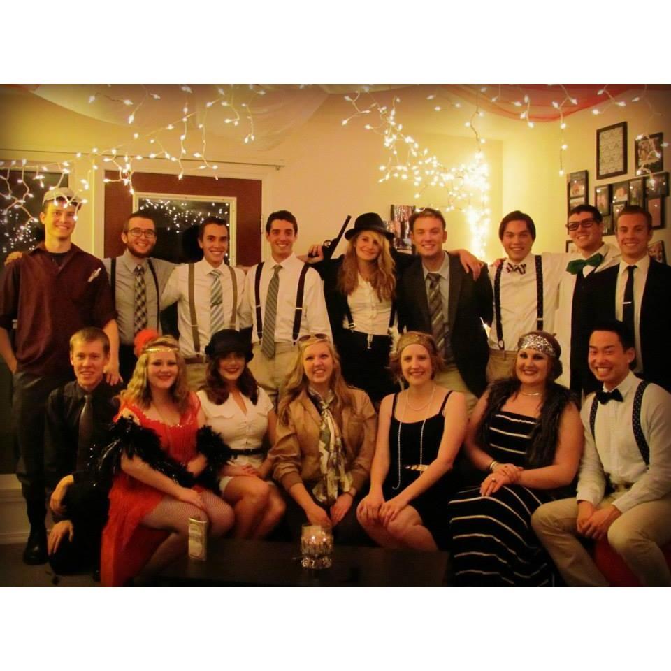 The whole crew dressed up for a Roaring 20's themed costume party