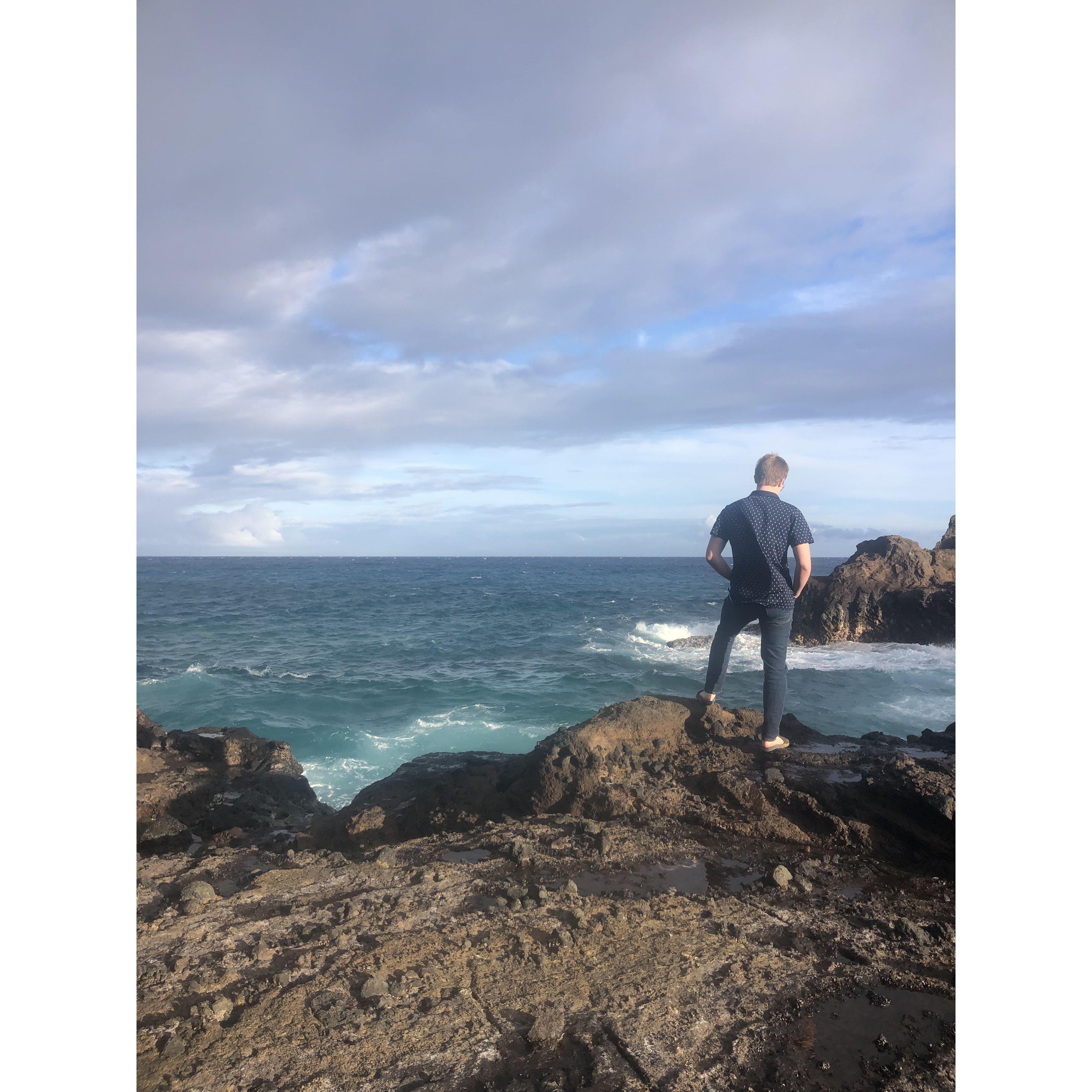 Peter dramatically looking out at From Here to Eternity beach