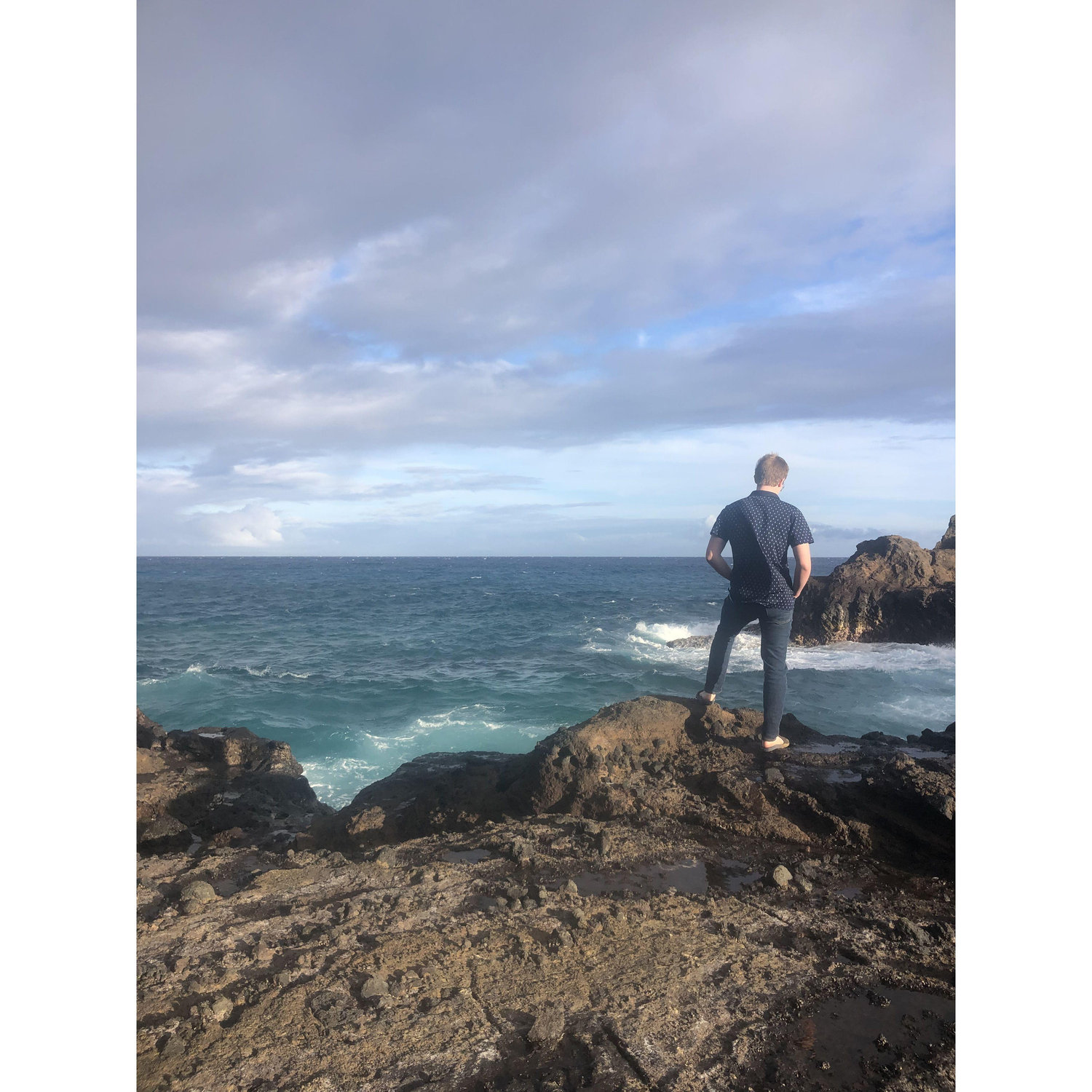 Peter dramatically looking out at From Here to Eternity beach