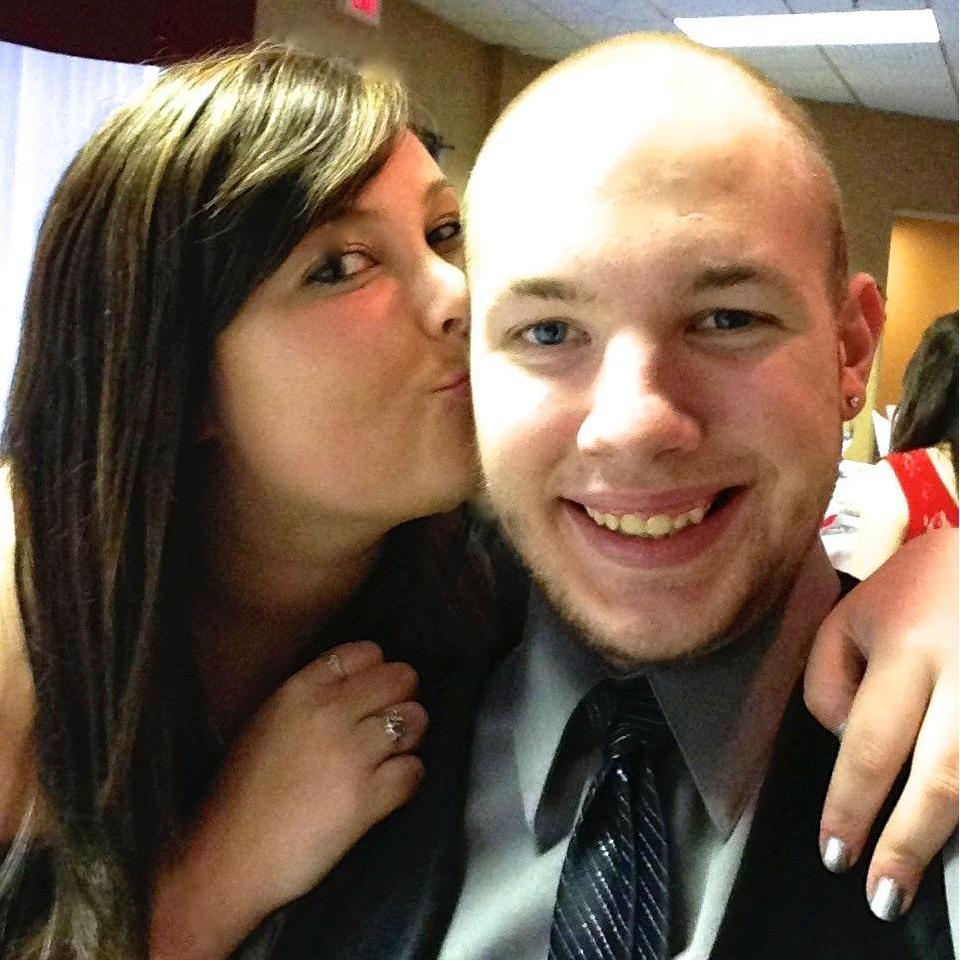 Kissing the bald guy!