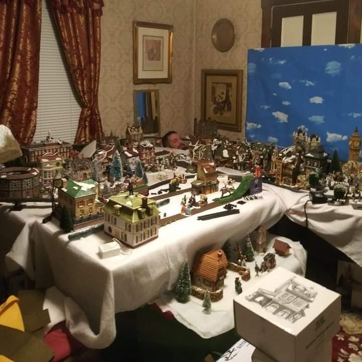 Sept. 30, 2021 - Joe came home to find Shawn busy at work on his Dickens Village.
