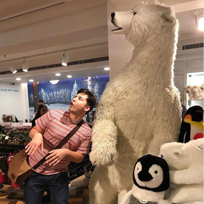 Robert and a polar bear do Thriller at Harrod's department store, London, June 2017.