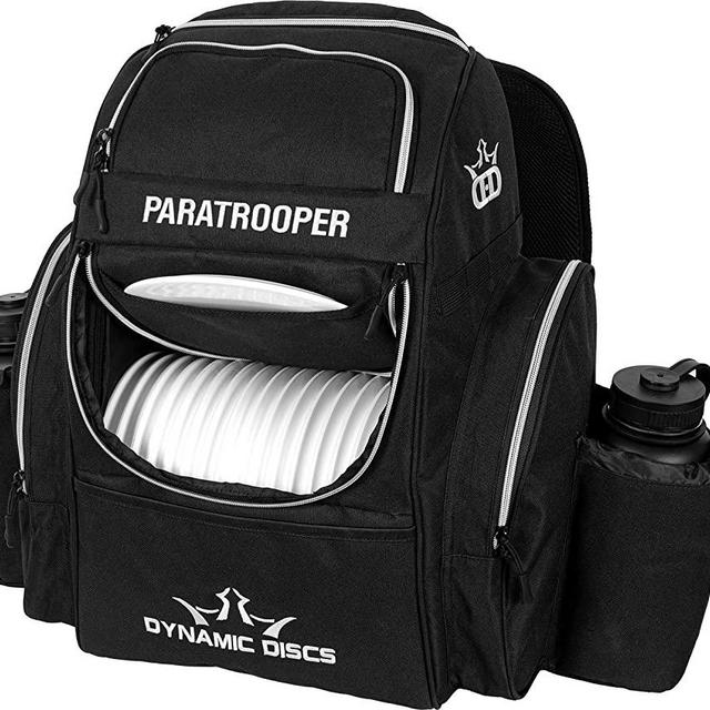 Dynamic Discs Paratrooper Disc Golf Bag | Frisbee Golf Backpack Bag with 18+ Disc Capacity | Extra Storage Pockets | Padded Straps and Back Panel | Durable Construction