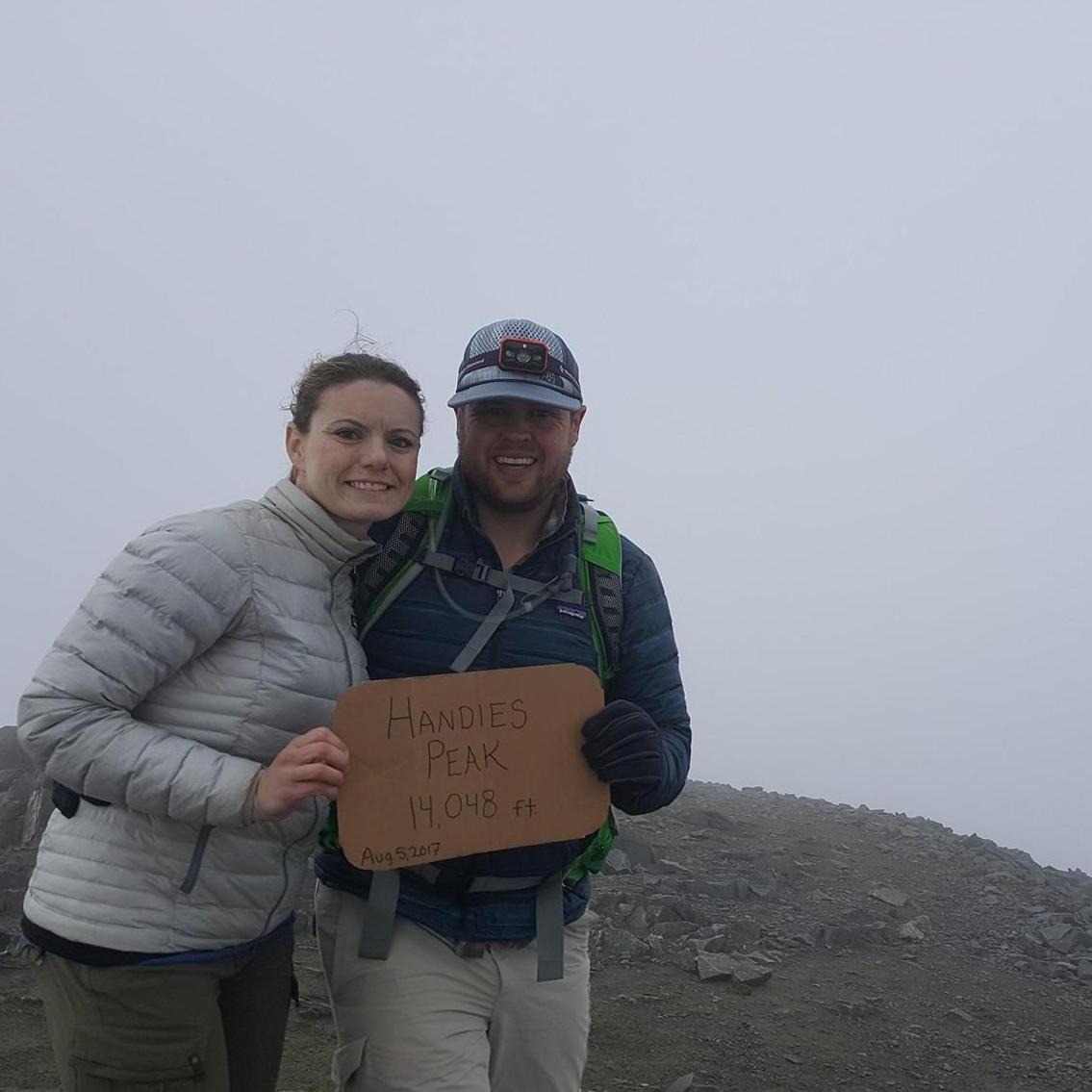 Enjoying an epic view at 14,000+ feet. If you want to hear a good story, ask us about our trip down Handies Peak.