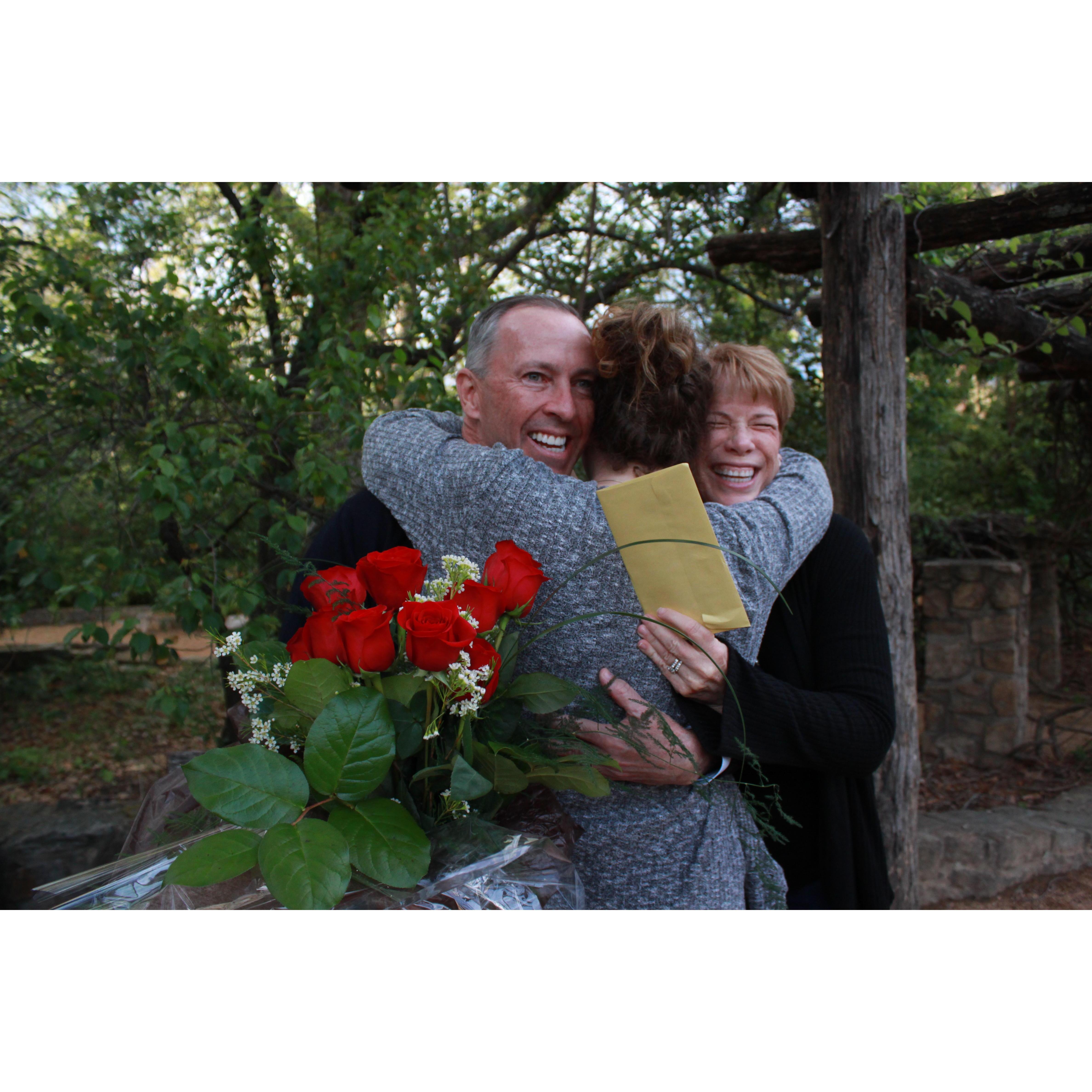 Surprising KG with her parents outside of Coker arboretum right before Ben proposed.