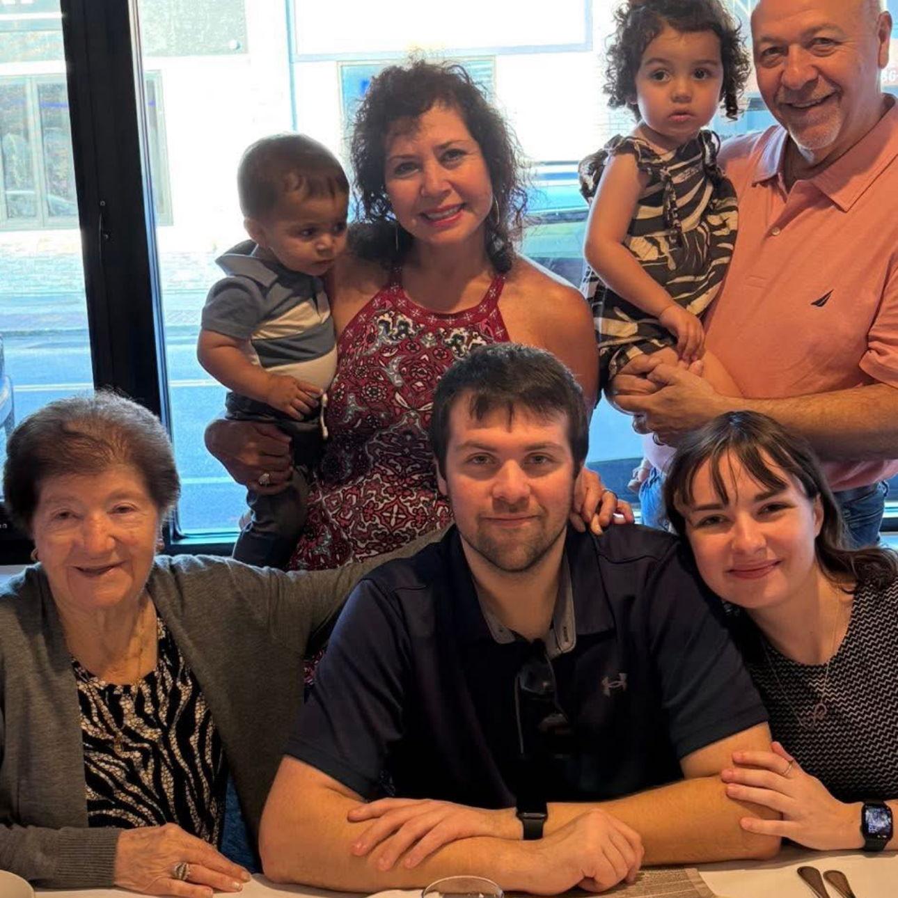 Us with Vinny's dad Vincenzo, step mom Claudia, Nonna, and step sisters kids Valentina and Vincenzo