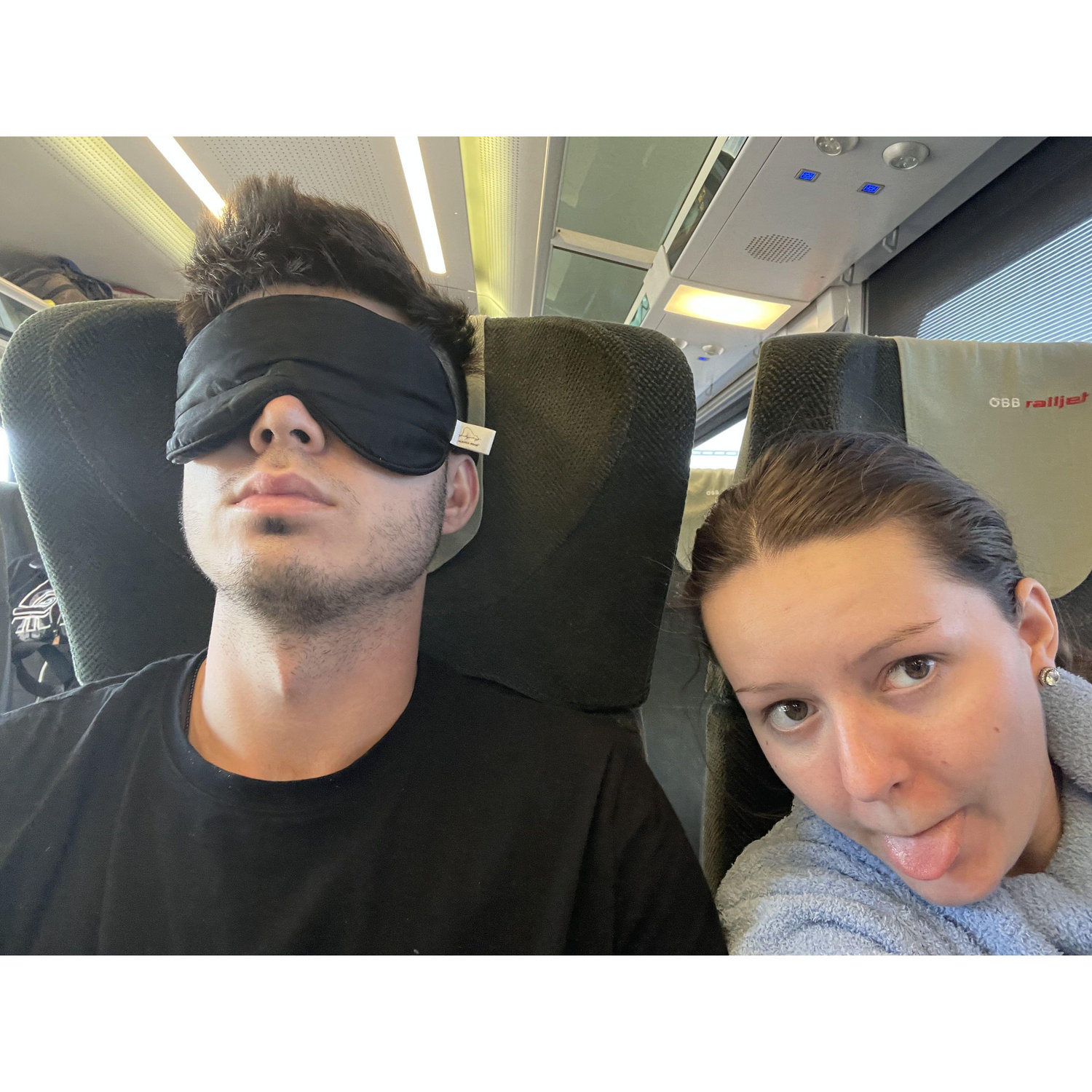 Alex catching a snooze on one of our many train rides in Europe.