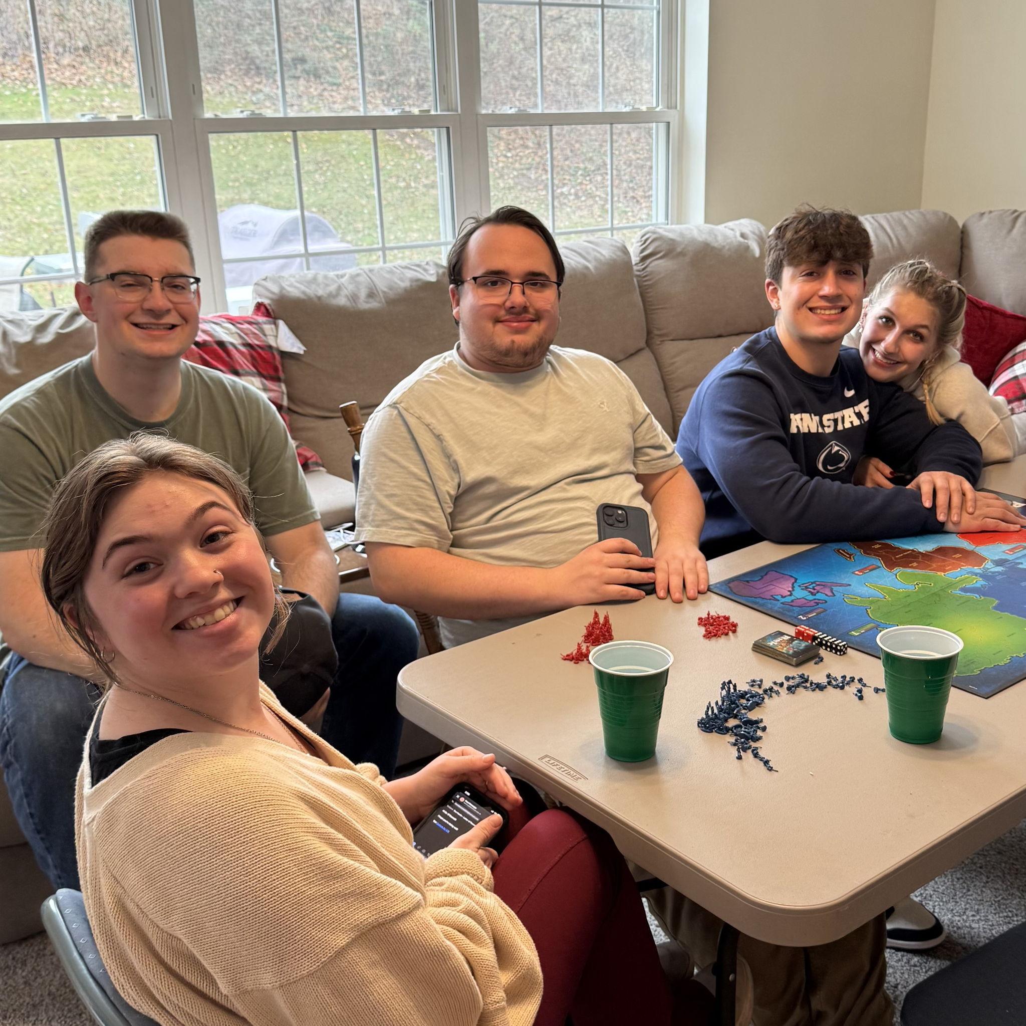 Eva watching Evan play battleships.